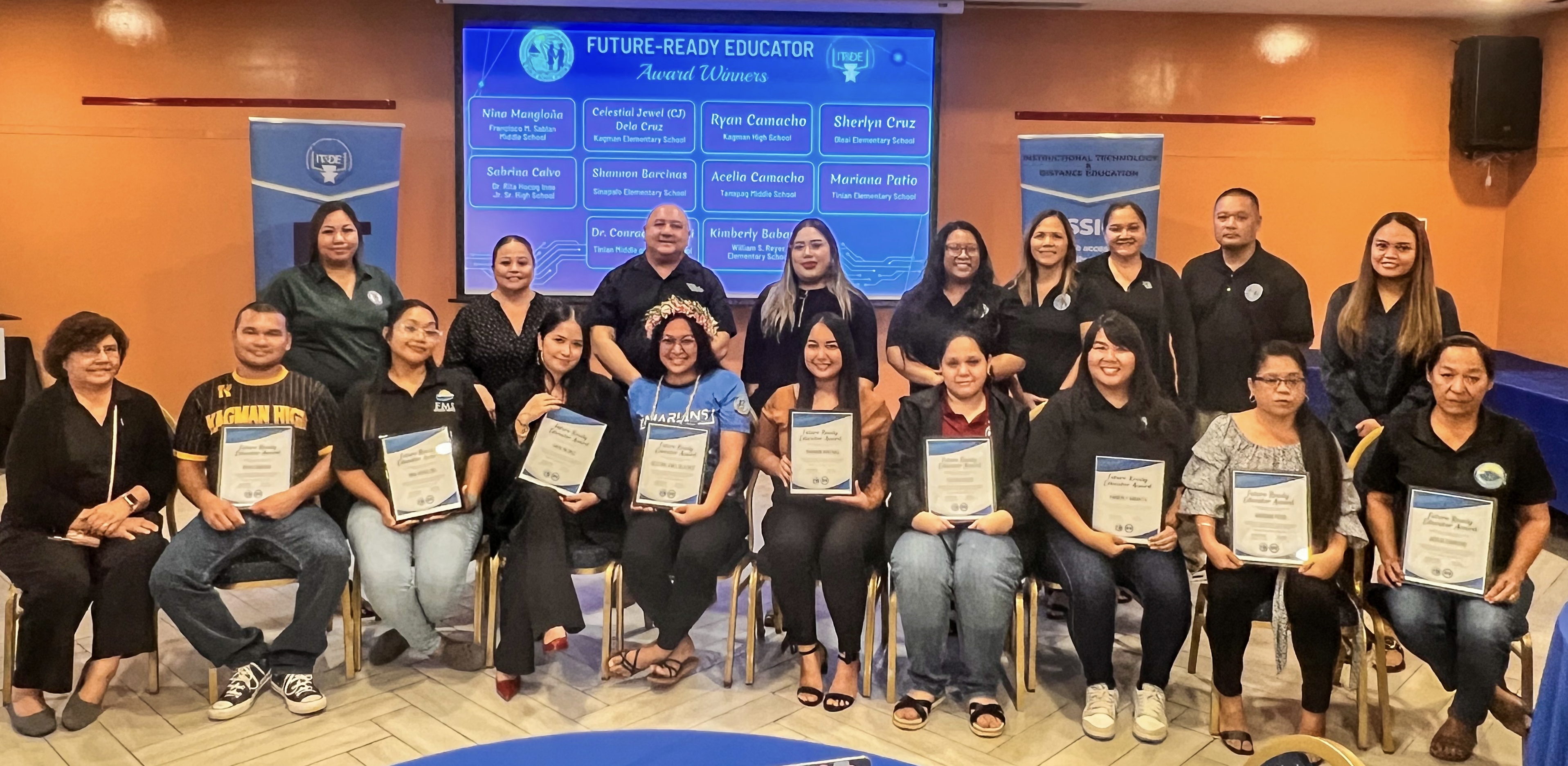 After receiving their awards from Commissioner of Education Dr. Lawrence F. Camacho and ITDE Director Dr. Lorraine Catienza, the educators who won the 2025 Digital Learning Day Competition are celebrated by their peers and other Public School System officials.