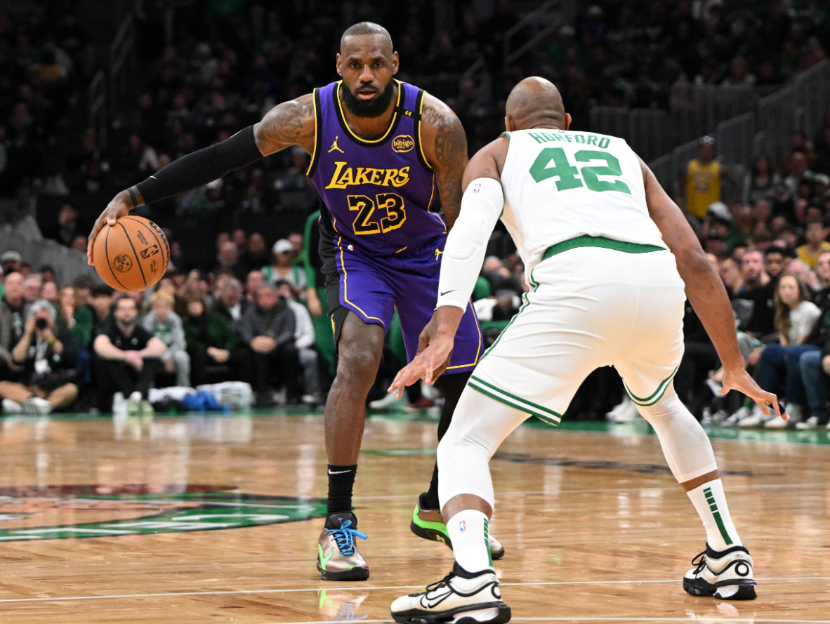 Los Angeles Lakers forward LeBron James (23) controls the ball against Boston Celtics center Al Horford (42) during the third quarter at the TD Garden in Boston, Massachusetts, March 8, 2025.