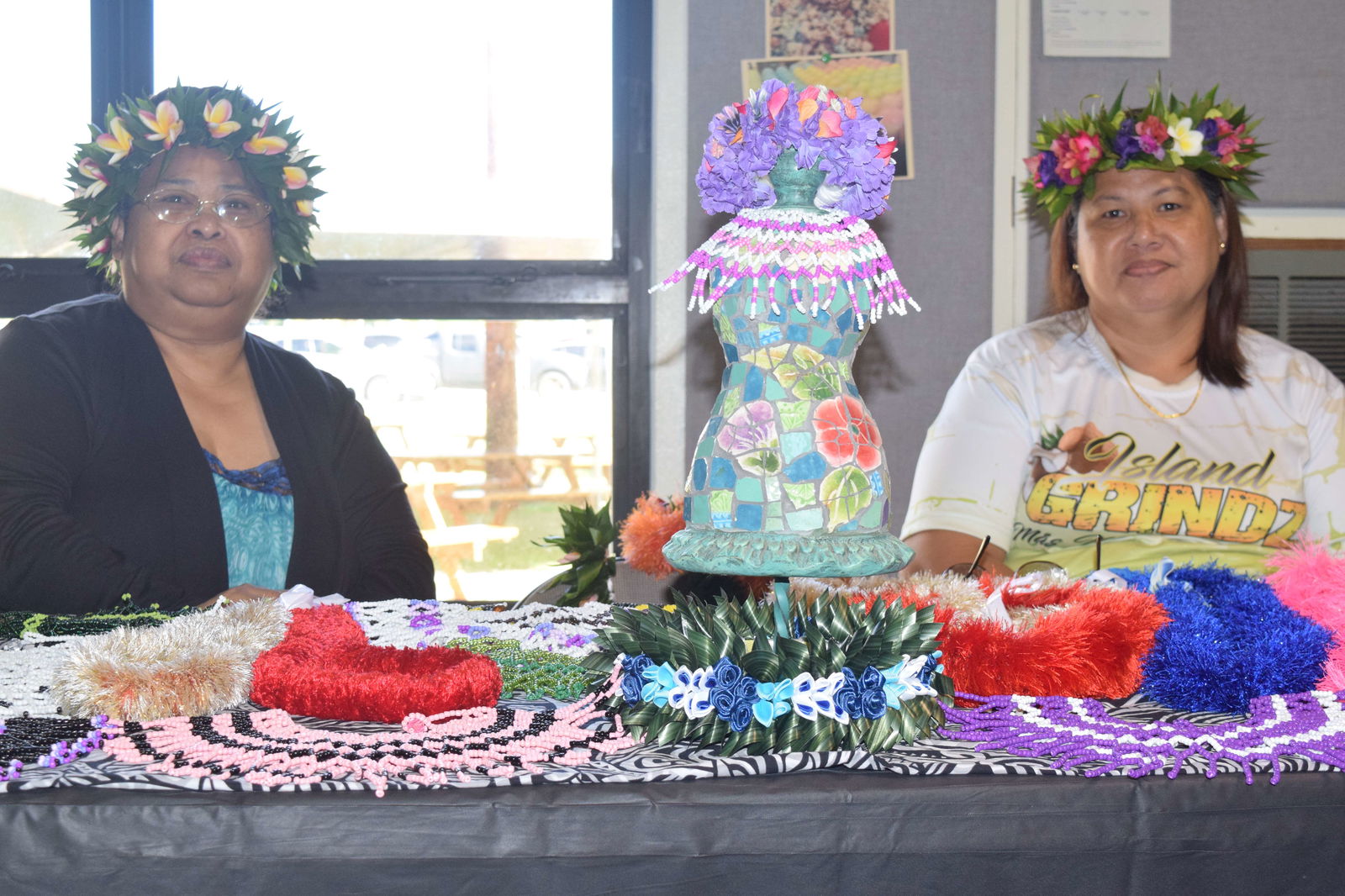 CNMI Arts & Culture Inc.’s Patricia Mareham, left, and Island Grindz’ Del Lieto at the 11th Annual CNMI Women's Summit.