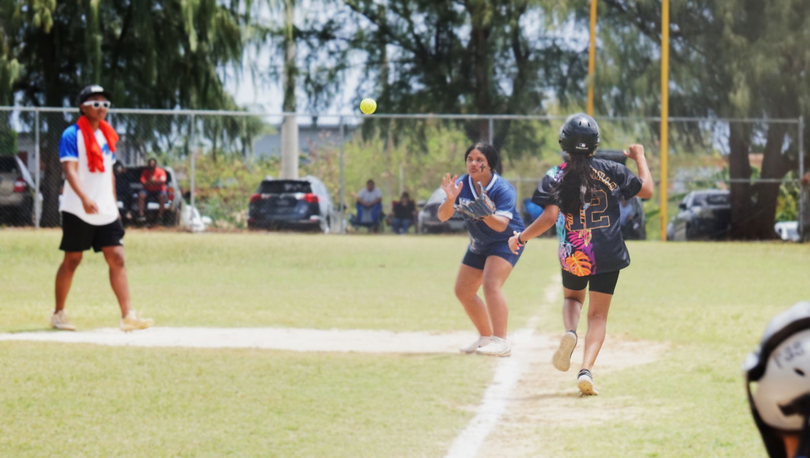 MCS first baseman Orchid Castro reaches out for the pick off during the championship game against TMS in the girls high school division of the PSS-NMISA Interscholastic Fast Pitch Softball League at the Dandan softball field on Saturday.
