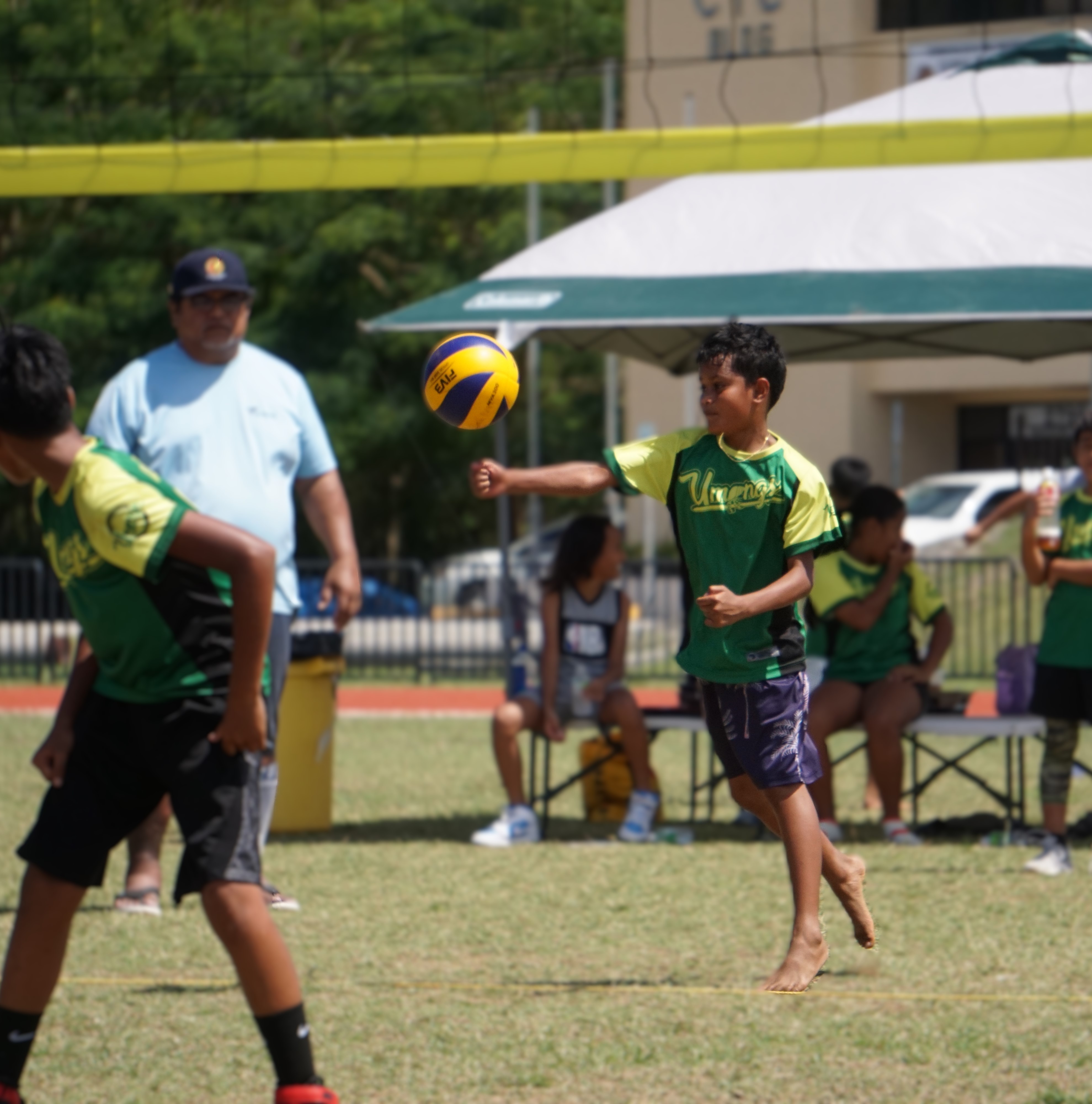 A KOB 1 player connects an underhand serve during the championship game in the co-ed elementary division of the PSS-NMIVA Interscholastic Volleyball League SY24-25 at the Oleai Sports Complex on Saturday.
