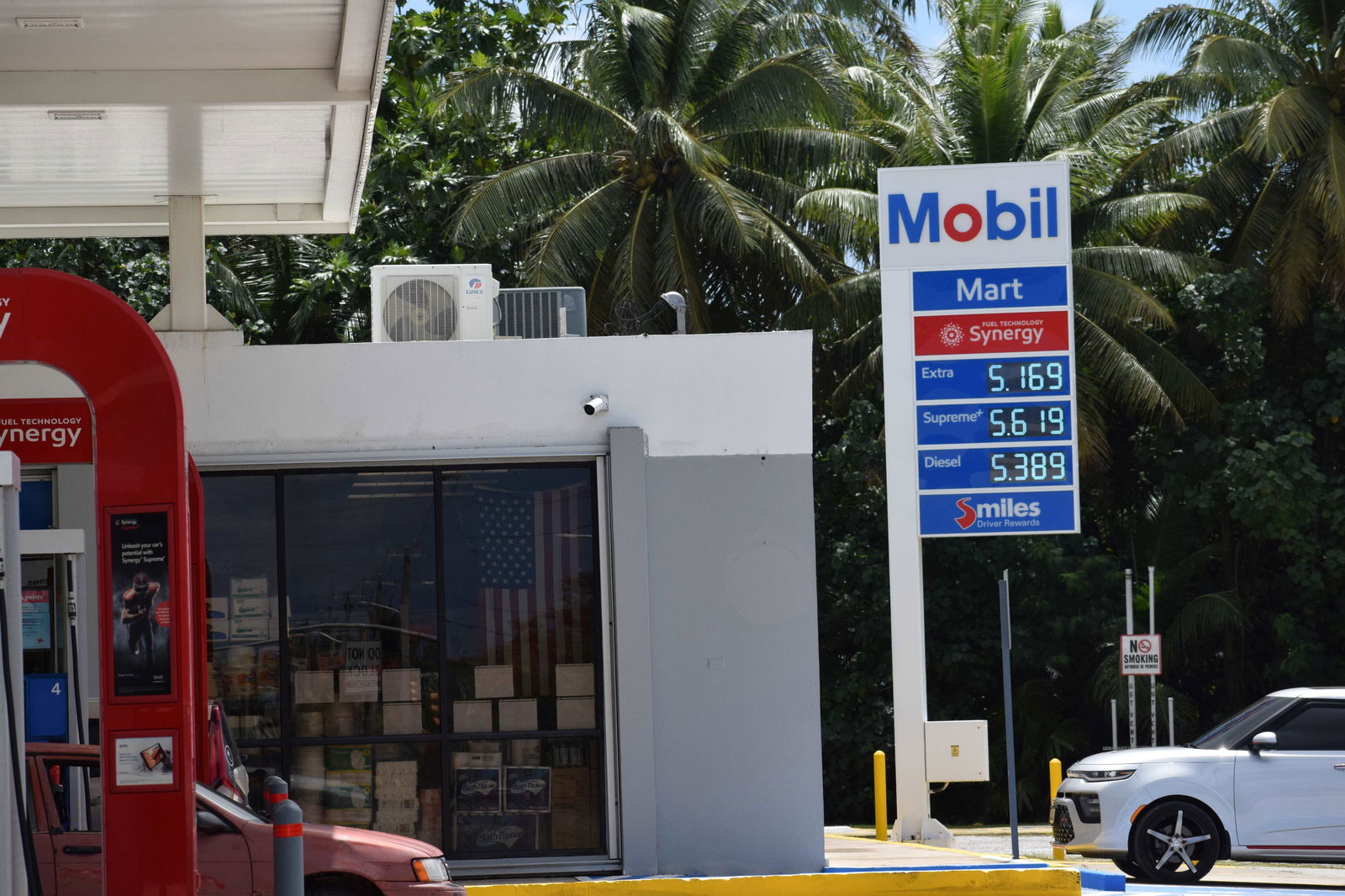 Mobil Oil Chalan Kiya displays its gasoline prices on Friday.