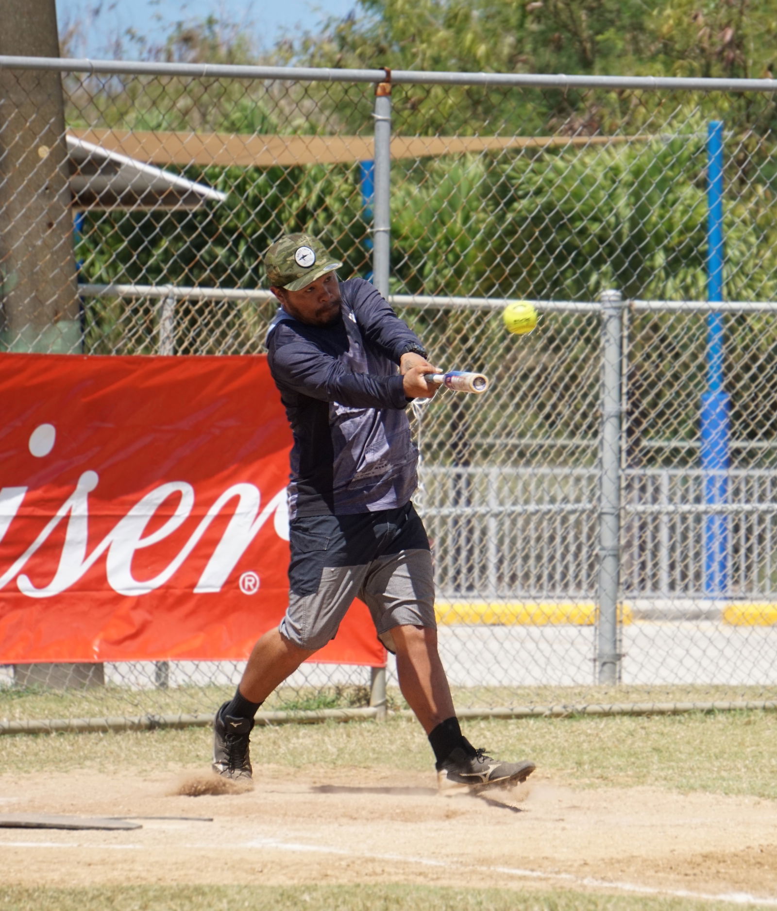Eagle Rays’ Mike Techur connects a 3-run homer during a game against Ngatpang in the open division of the 2025 Budweiser Belau Amateur Softball League at the Dandan softball field on Sunday.Photos by James F. Sablan Jr.