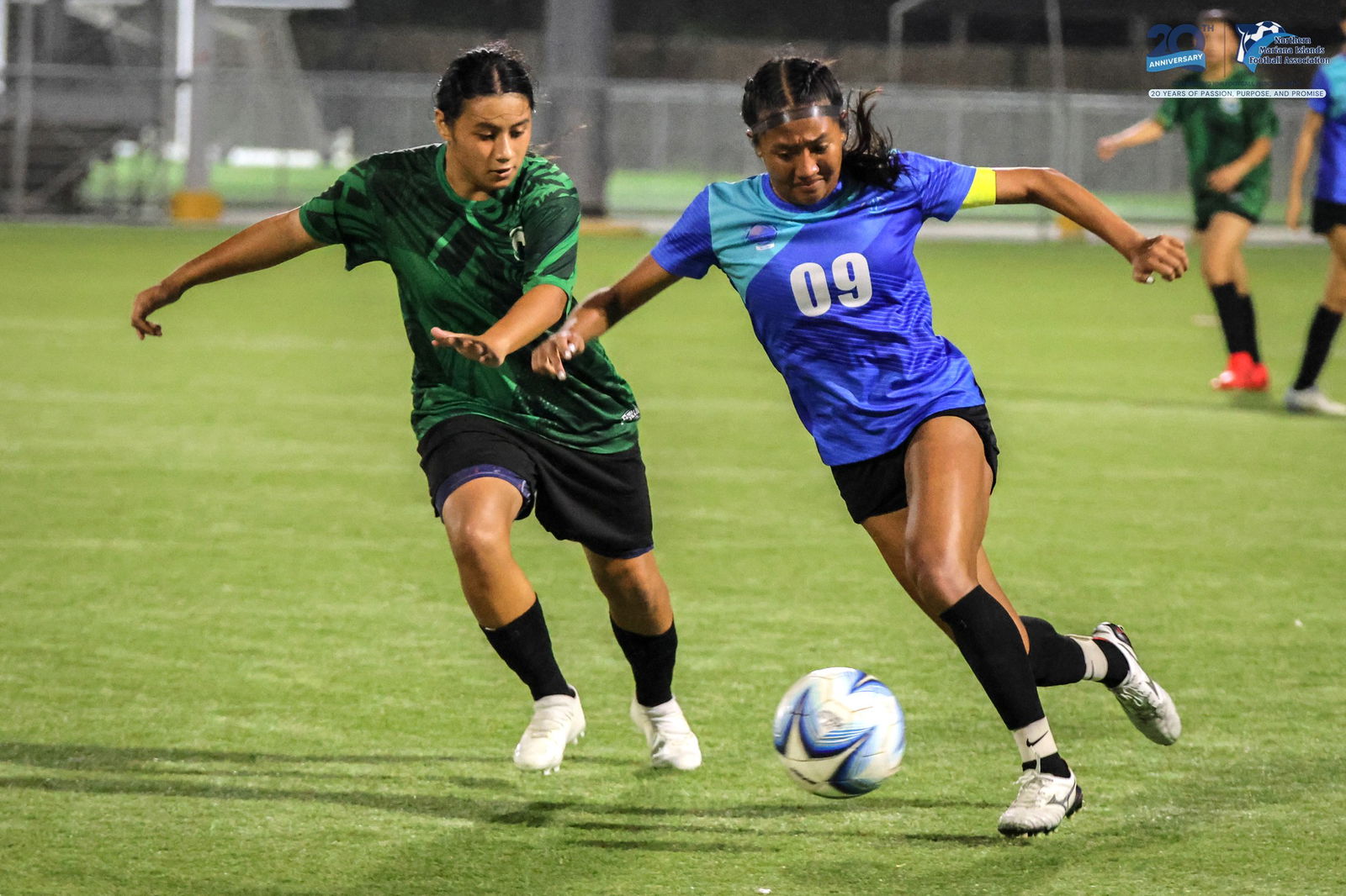 SIS’ Kaithlyn Chavez defends the ball against SSHS’ Rosie Saralu during the girls high school division finals of the PSS-NMIFA Interscholastic Soccer League SY24-25 at the NMI Soccer Training Center in Koblerville.