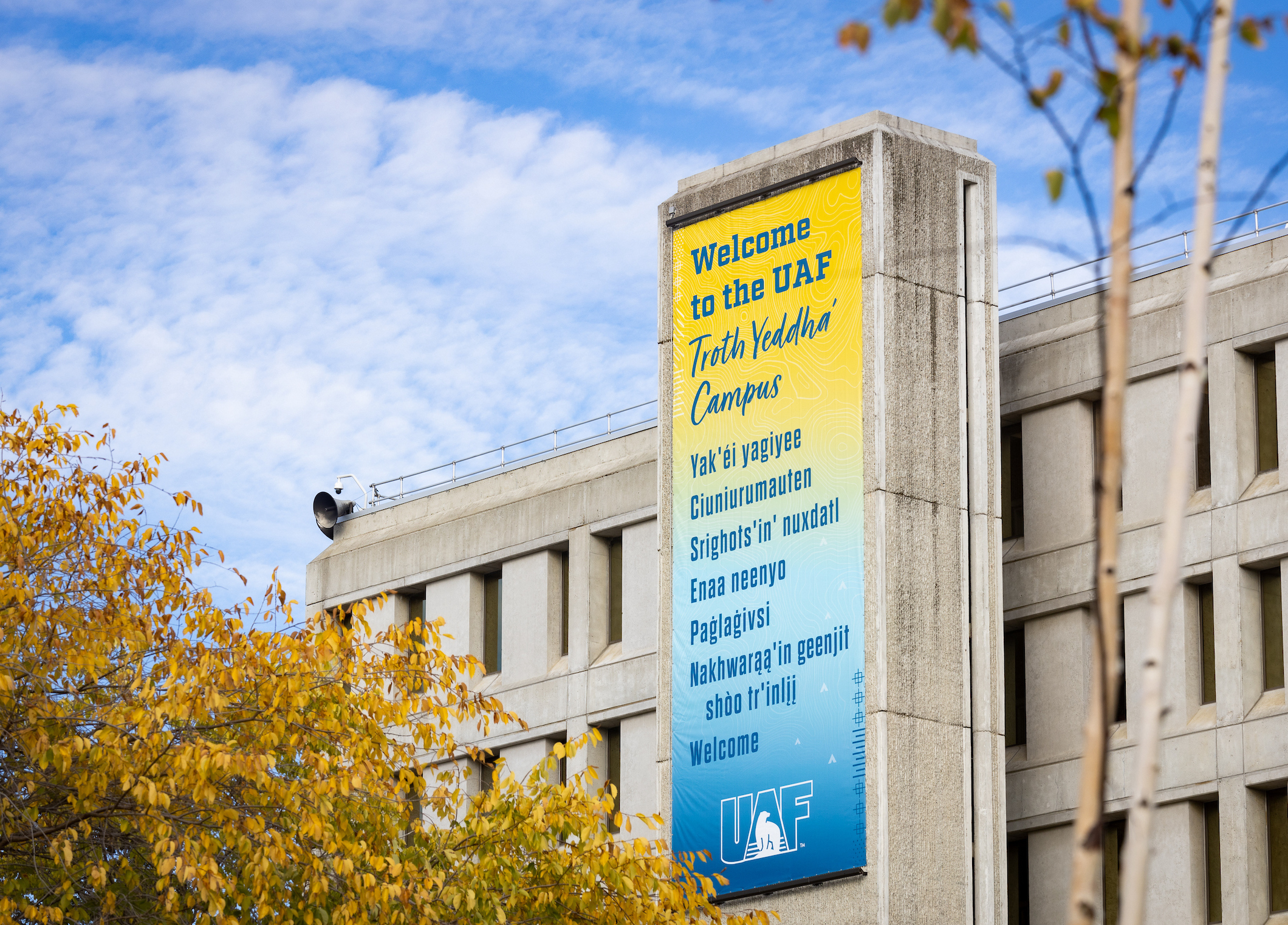 A sign on the University of Alaska Fairbanks Troth Yeddha’ campus welcomes people in multiple Alaska Native languages.UAF photo by Leif Van Cise