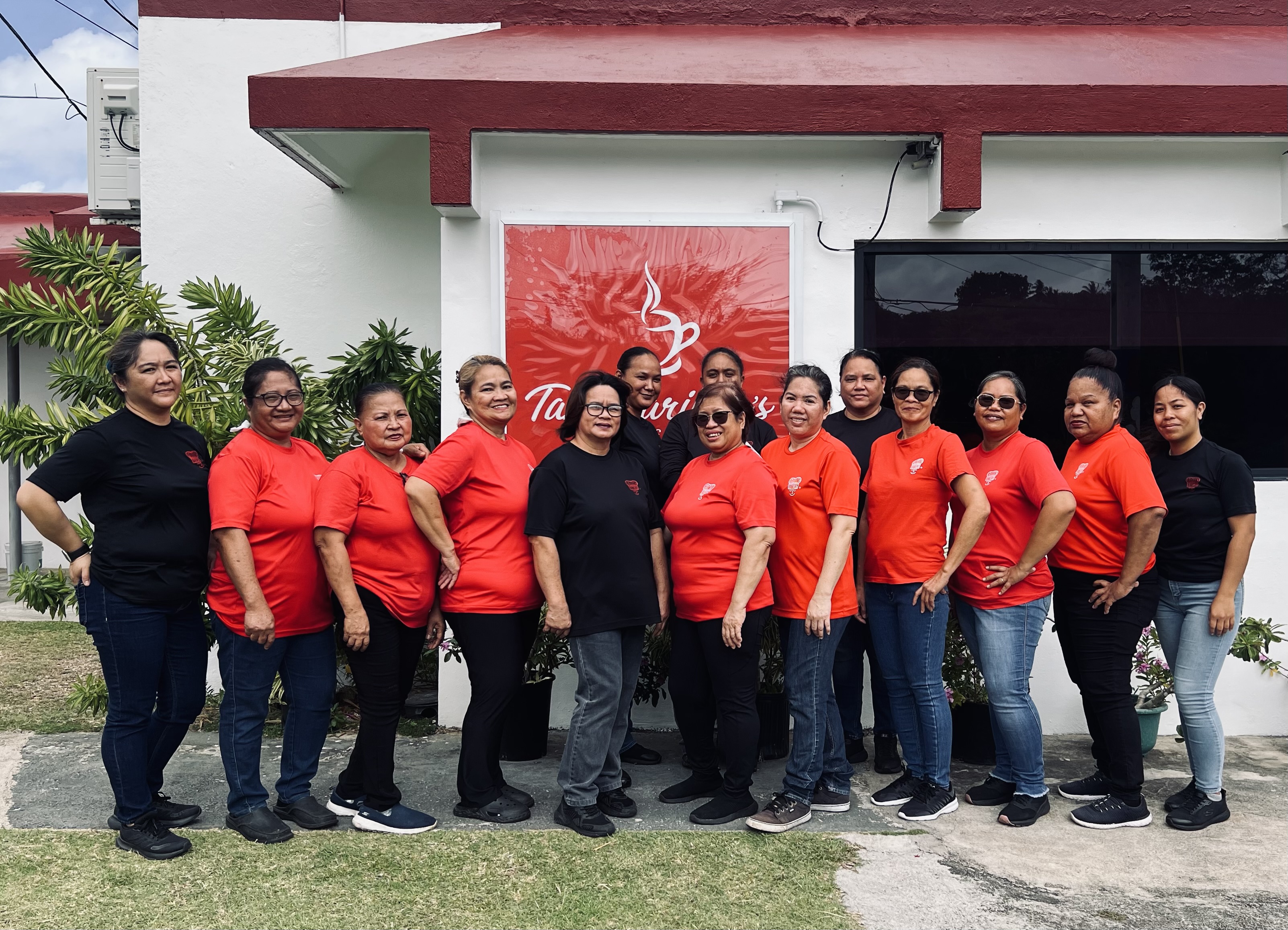 Front row, Madonna Floresca, Jeny Munar, Josephine Estillore, Marites Hossain, Bella Castillo, Wilma Dellota, Glenda Sacayan, Aniceta Labang, Jacqeulin Castro, Janet Rasiang, and Janelle Lizama. Back row, Sorena Cabrera, Daveyann Iguel, Tricia Diaz.