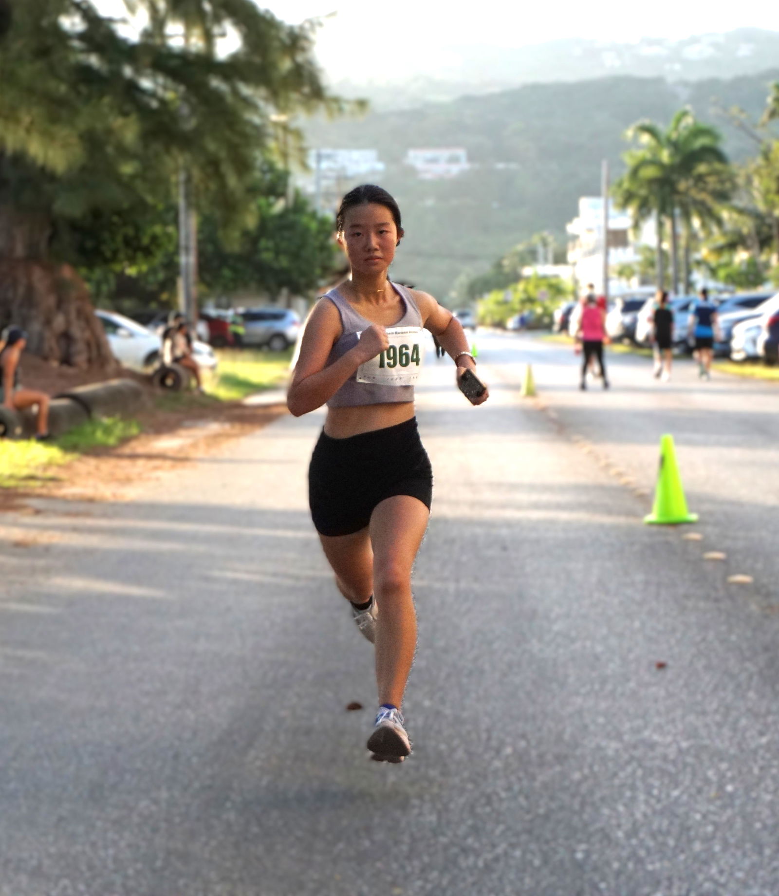 Catherine Pan finishes first in the U18 division of the Northern Marianas Athletics’ 5th Annual NMI 10km Women's Run at Micro Beach on Saturday morning.Photo by James F. Sablan Jr.