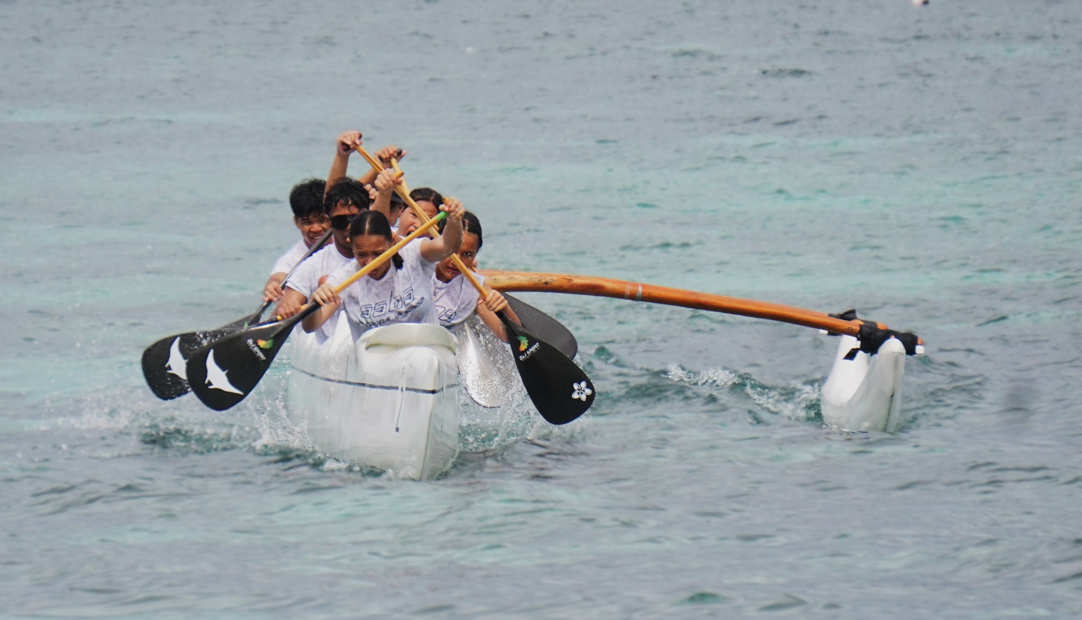 The Saipan Southern High School mixed division team pushes for a first-place finish in the 1000m finals of the PSS-NMNPSF Interscholastic Outrigger Race Series SY24-25 at Kilili Beach on Saturday.