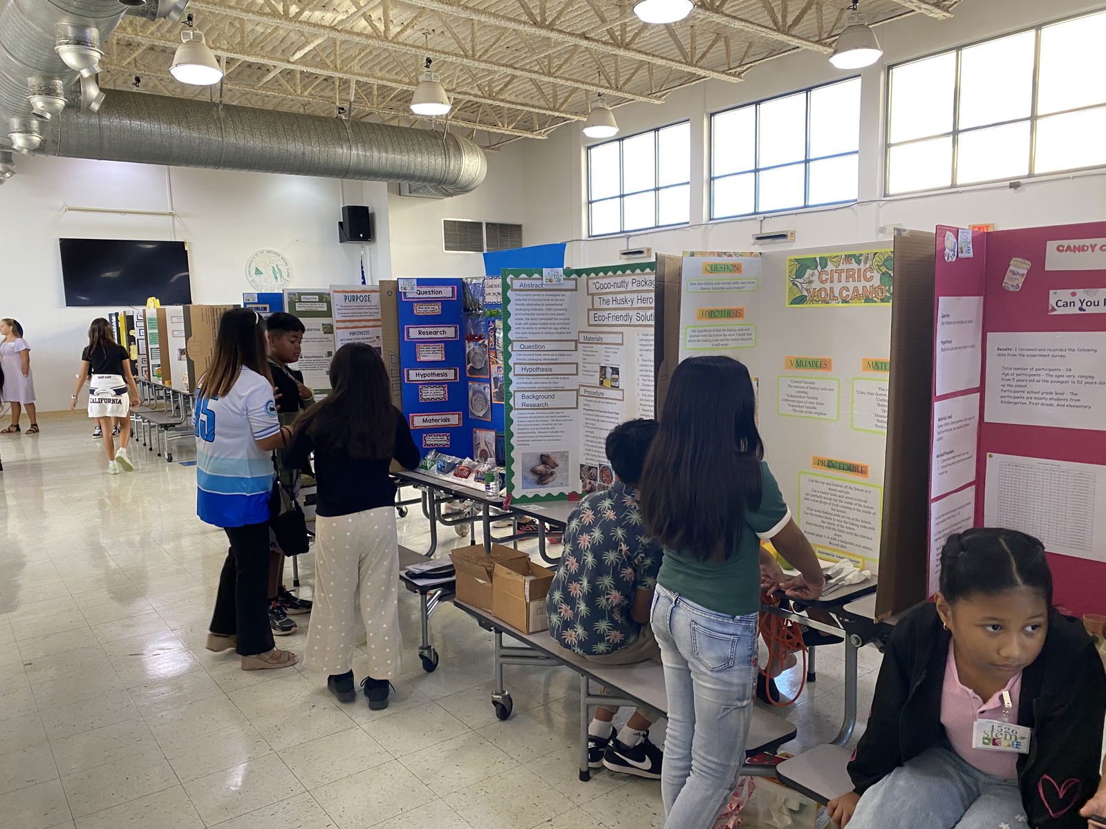 Parents and students view the presentations at the islandwide STEM Fair at Chacha Ocean View Middle School on March 8, 2025.