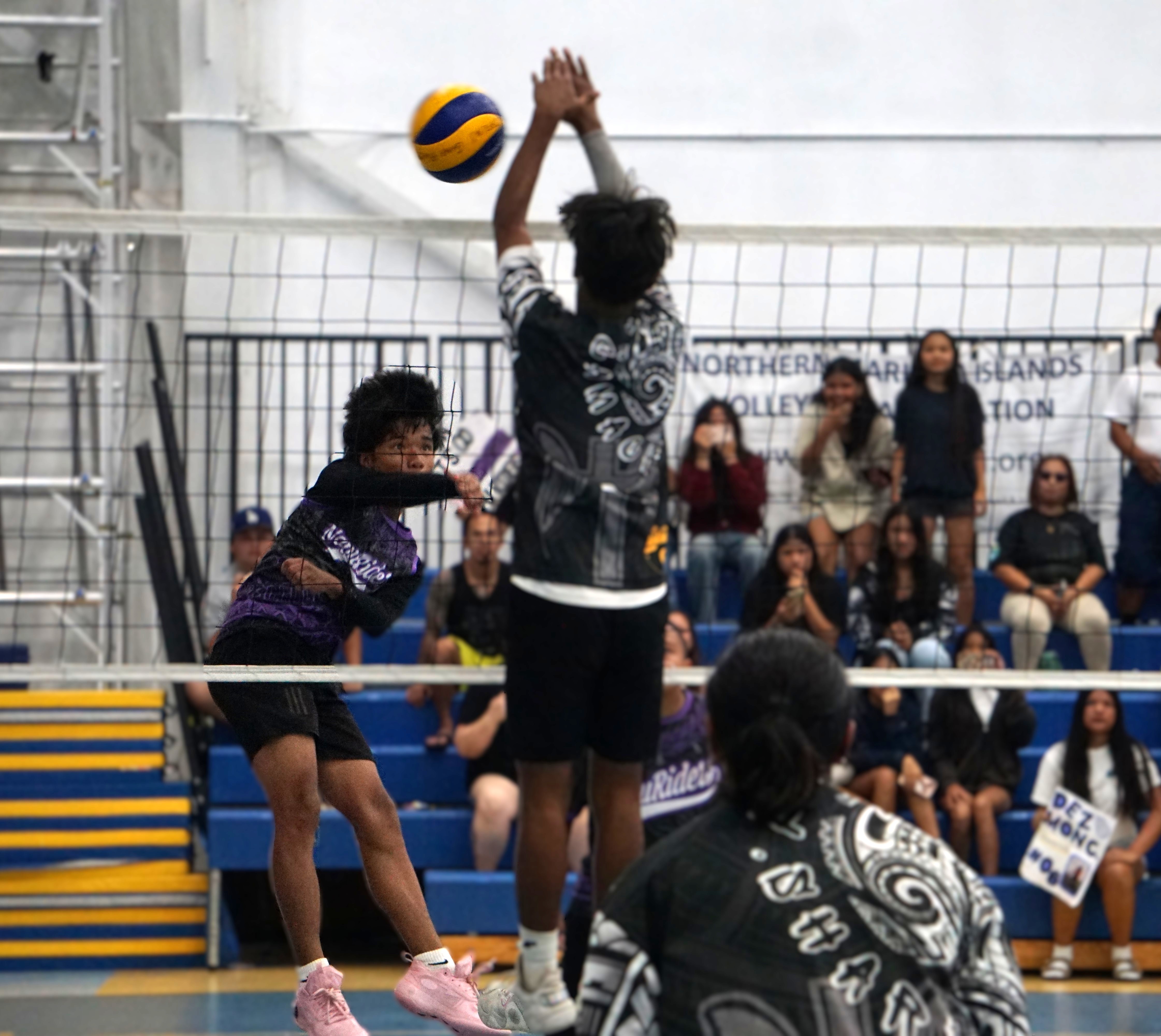 FMS' Timothy Espiritu connects the game-winning spike during the title game against TMS in the boys middle school division of the PSS-NMIVA Interscholastic Volleyball League SY24-25 at the MHS gym on Saturday.Photo by James F. Sablan Jr.
