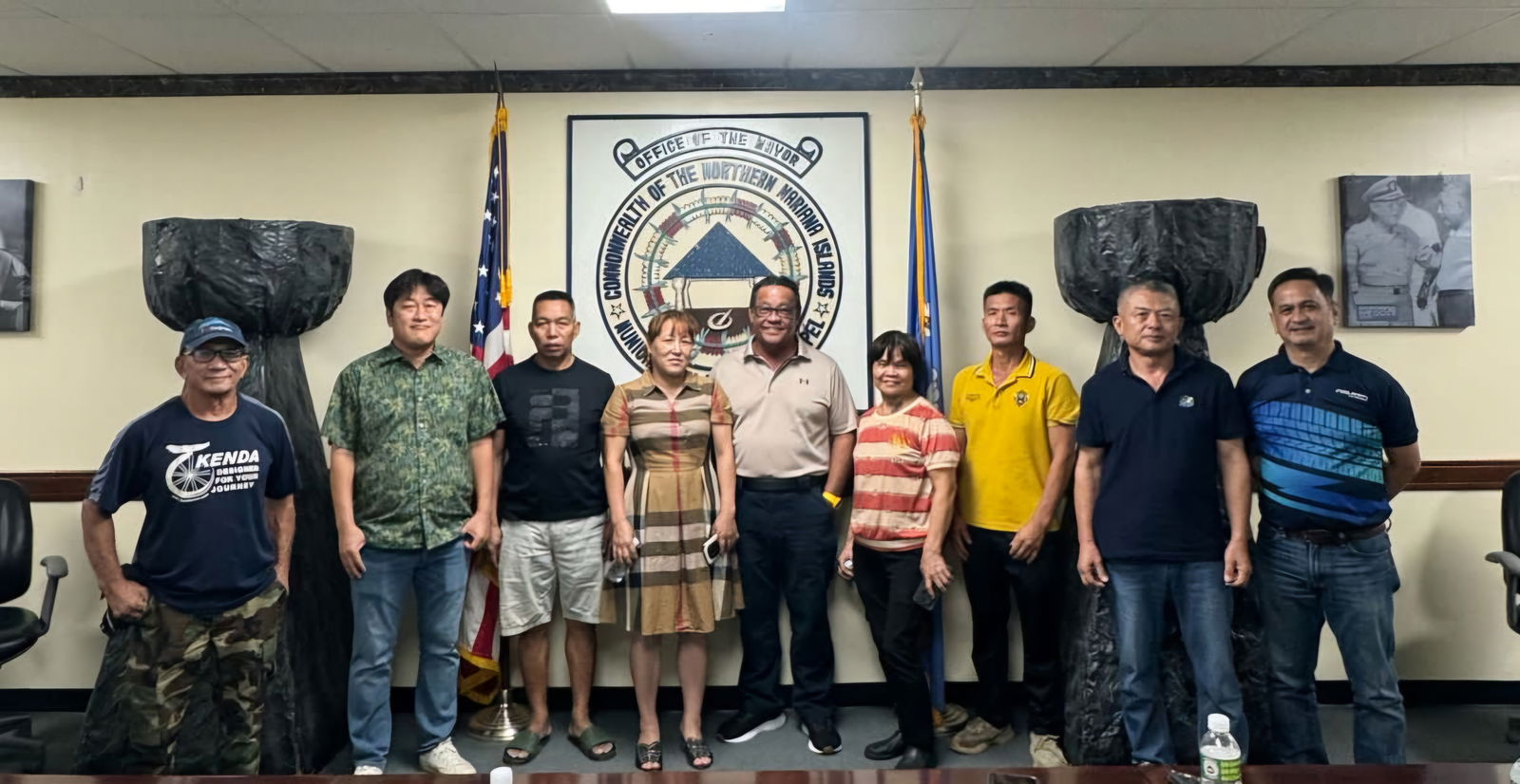 Saipan Mayor RB Camacho poses for a photo with Saipan tire shop owners during a recent meeting.