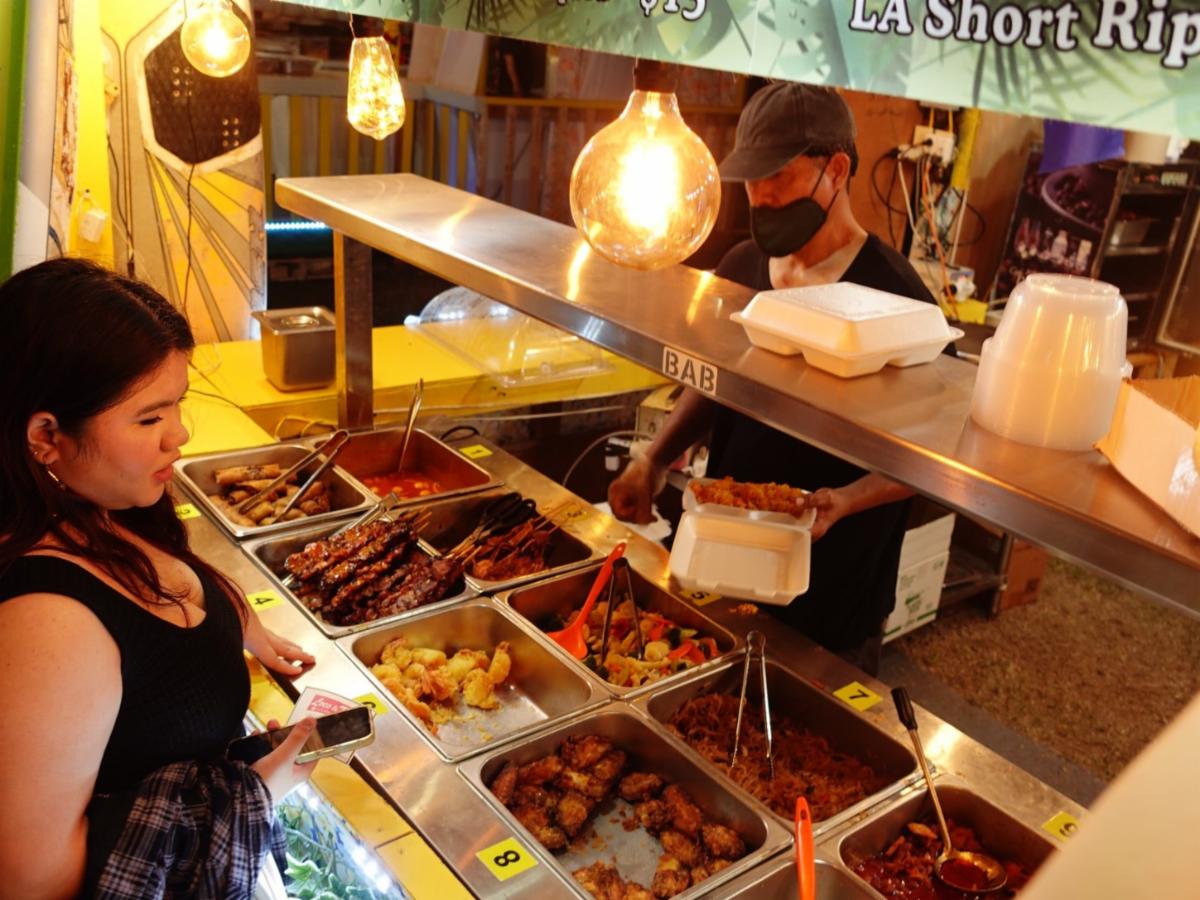 A festivalgoer makes her choice at the Taste of The Marianas International Food Festival in The Marianas in May 2024. The 26th Annual Taste of The Marianas will be held every Saturday evening in May 2025 at American Memorial Park in Garapan, Saipan.MVA photo