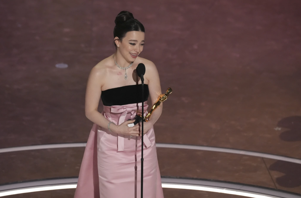 Mikey Madison accepts the award for best performance by an actress in a leading role for "Anora" during the Oscars on Sunday, March 2, 2025, at the Dolby Theatre in Los Angeles.