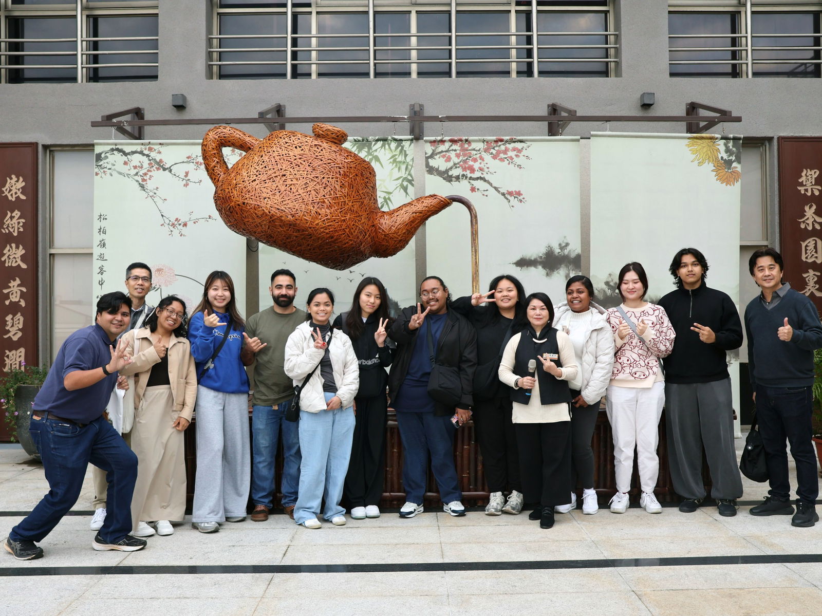 University of Guam agriculture and business students take a group photo outside the Songboling Visitor Center and Tea Culture Theme Pavilion in Nantou County, Taiwan.