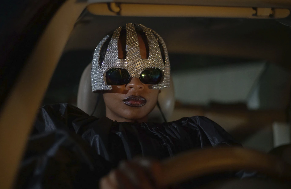 This image released by A24 shows Elizabeth Chisela in a scene from “On Becoming a Guinea Fowl.”