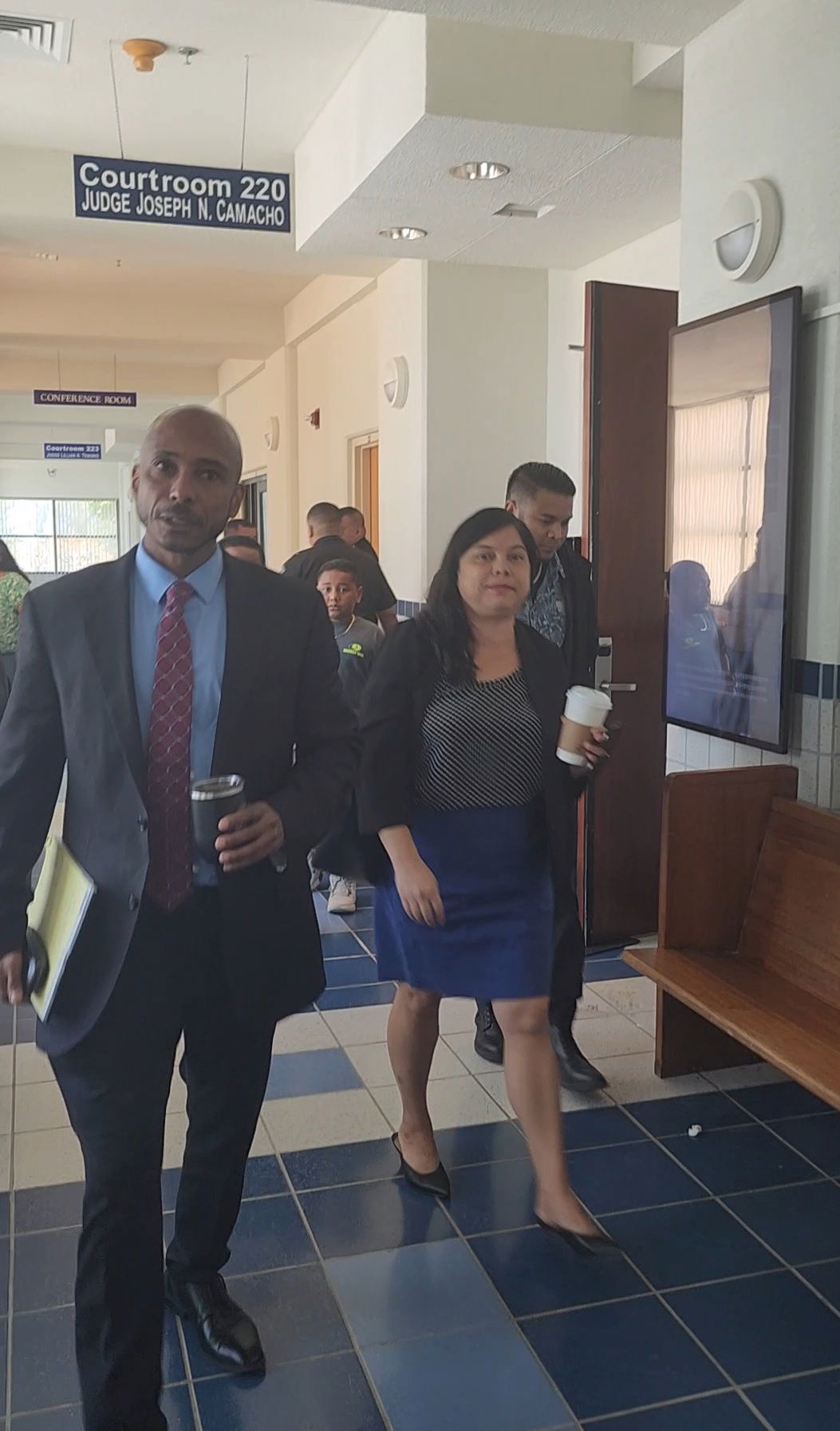 Chief Prosecutor Chester Hinds and Assistant Attorney General Heather Barcinas leave the courtroom following the jury trial of Calvin Tagabuel on Monday morning.