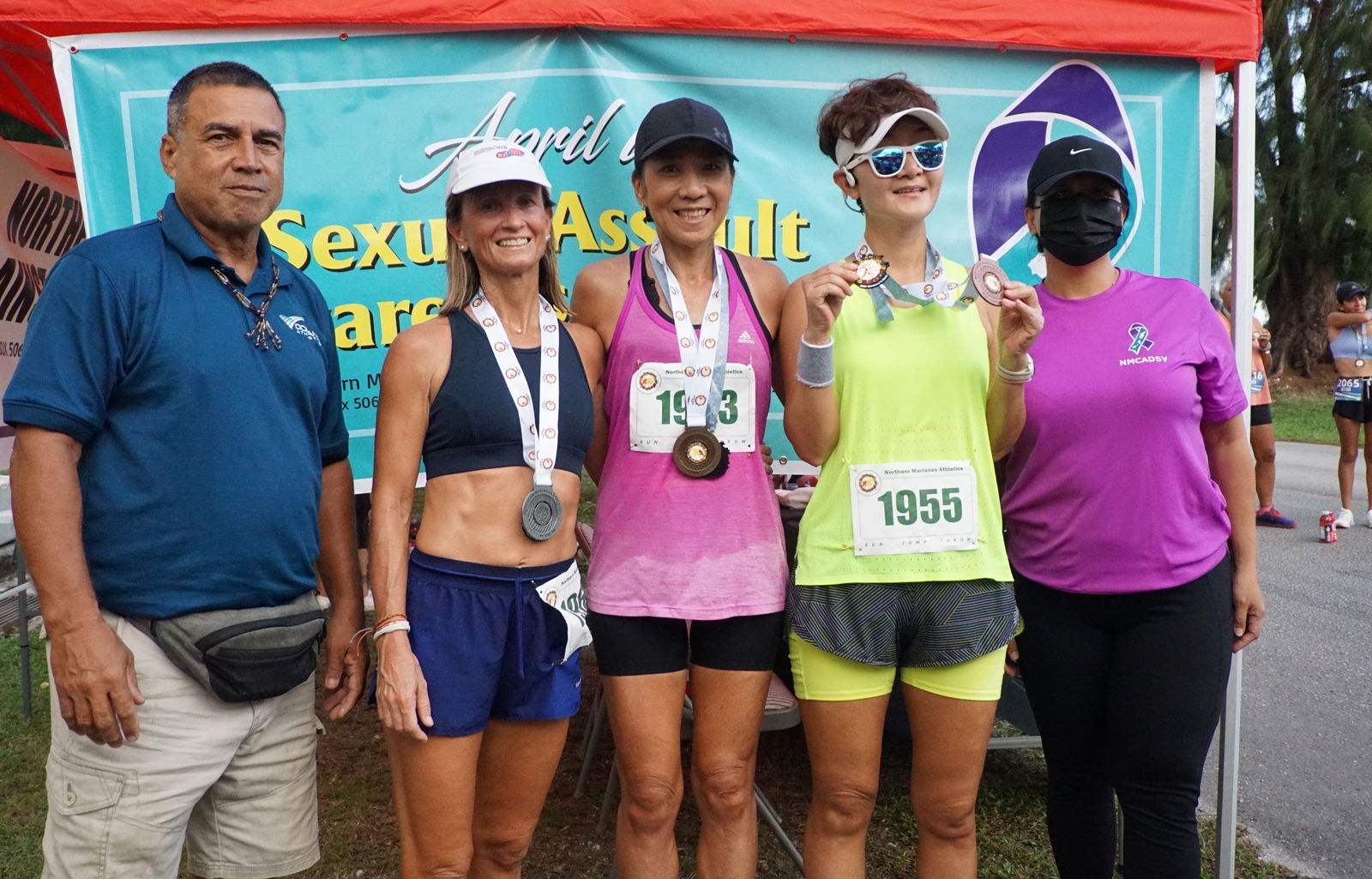 Akiko Miller, center, Krista Hawley and Ann Bang are the top 3 overall winners of the Northern Marianas Athletics’ 5th Annual NMI 10km Women’s Run at Micro Beach on Saturday morning.Photo by James F. Sablan Jr.