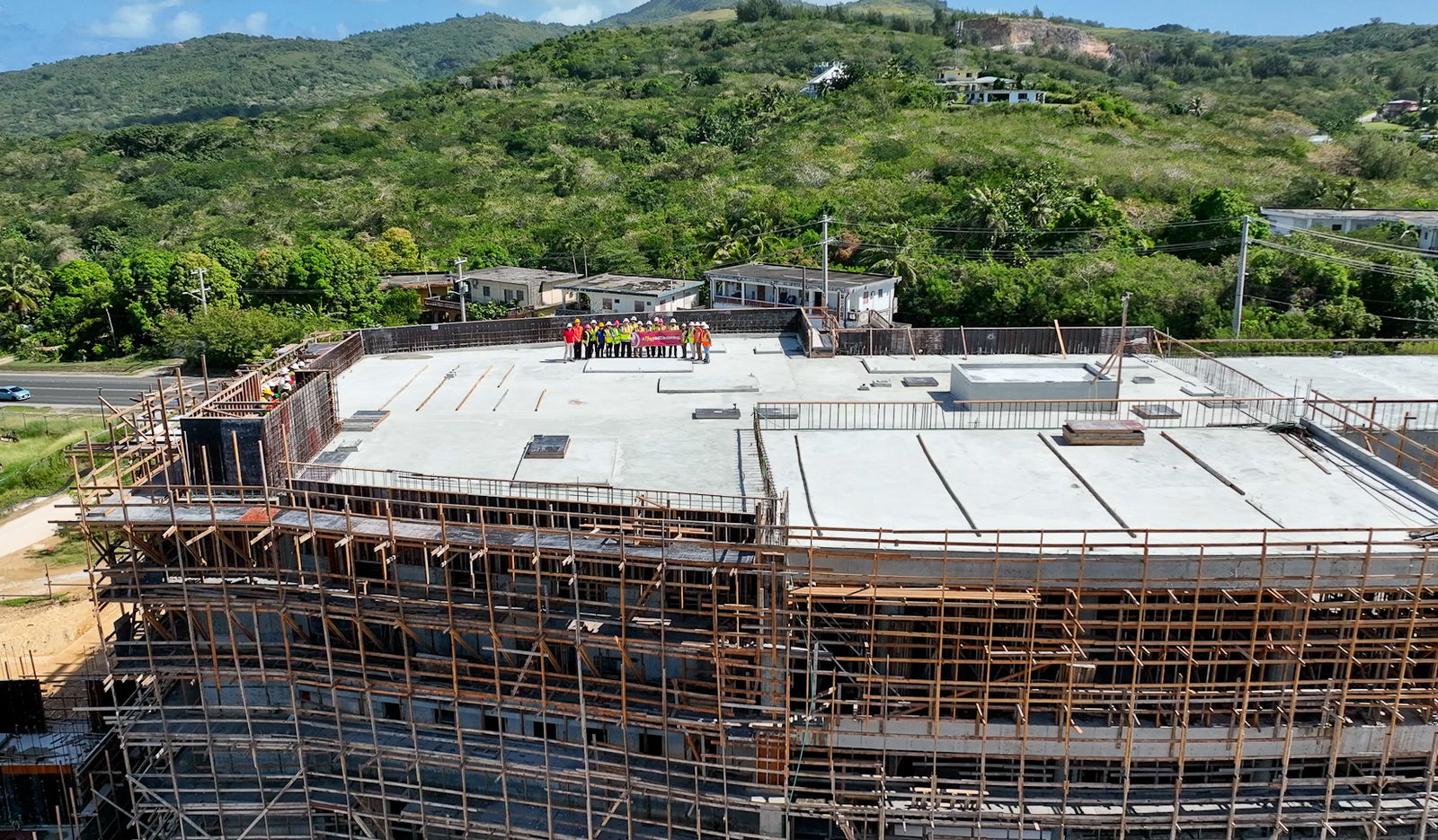 CNMI officials led by Gov. Arnold I. Palacios and Lt. Gov. David M. Apatang joined Northern Marianas College officials and project partners to commemorate the topping out of NMC’s new Student Center building on Tuesday.NMC photo