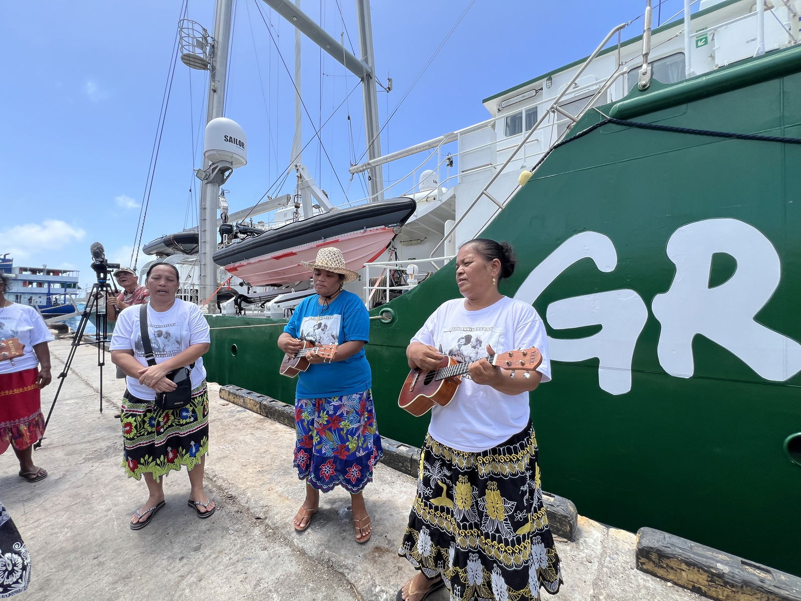 Marshall Islands traditional and government leaders joined Greenpeace representatives in showing off tapa banners with the words "Justice for Marshall Islands" during the dockside welcome ceremony earlier this week in Majuro.Photo by Giff Johnson