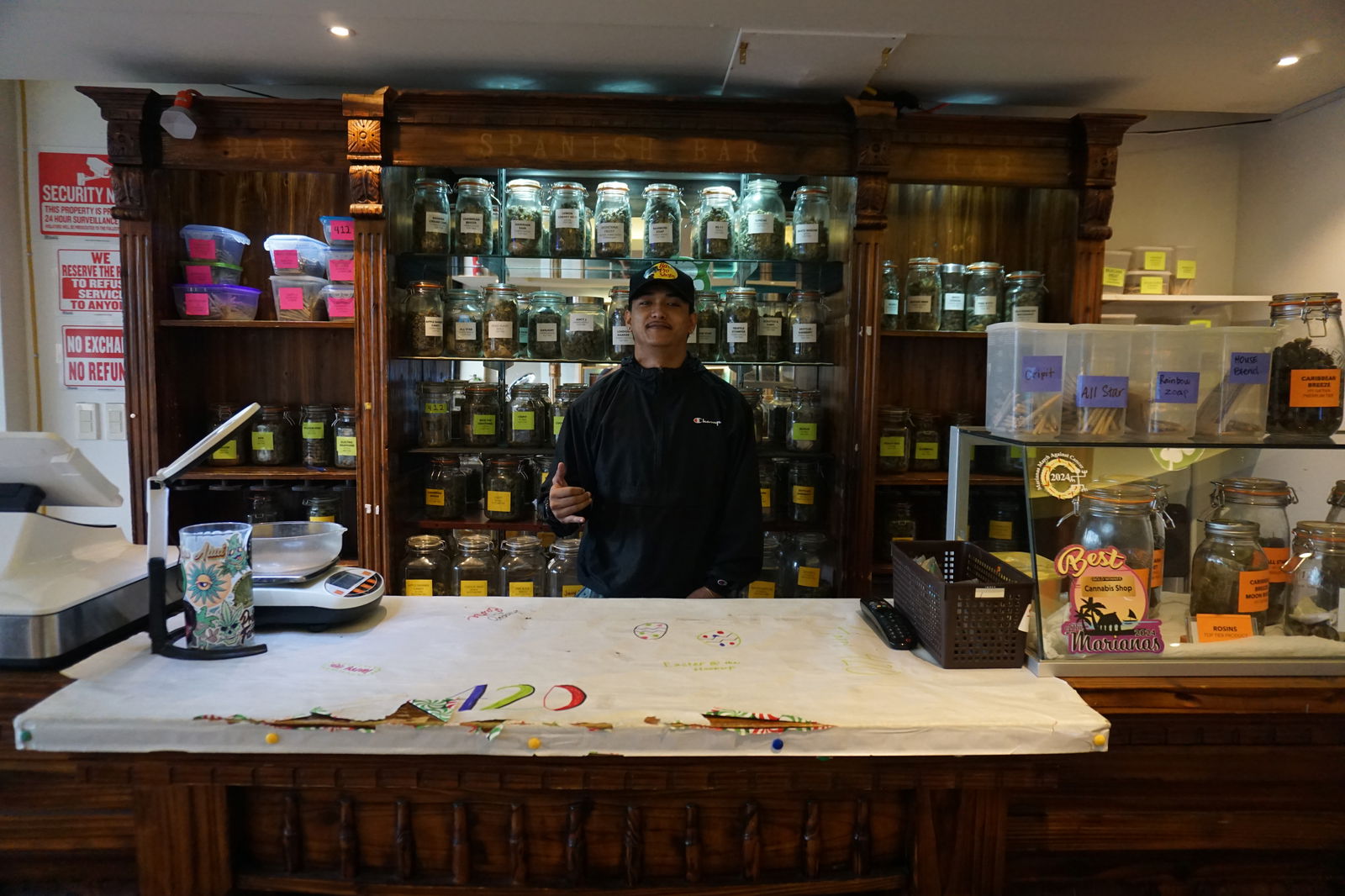 Budtender Gaige Porras takes care of The HookUp on Saturday, April 19, aka 420 Eve.