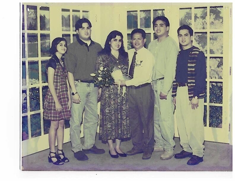 This old photograph shows the Yumul family.