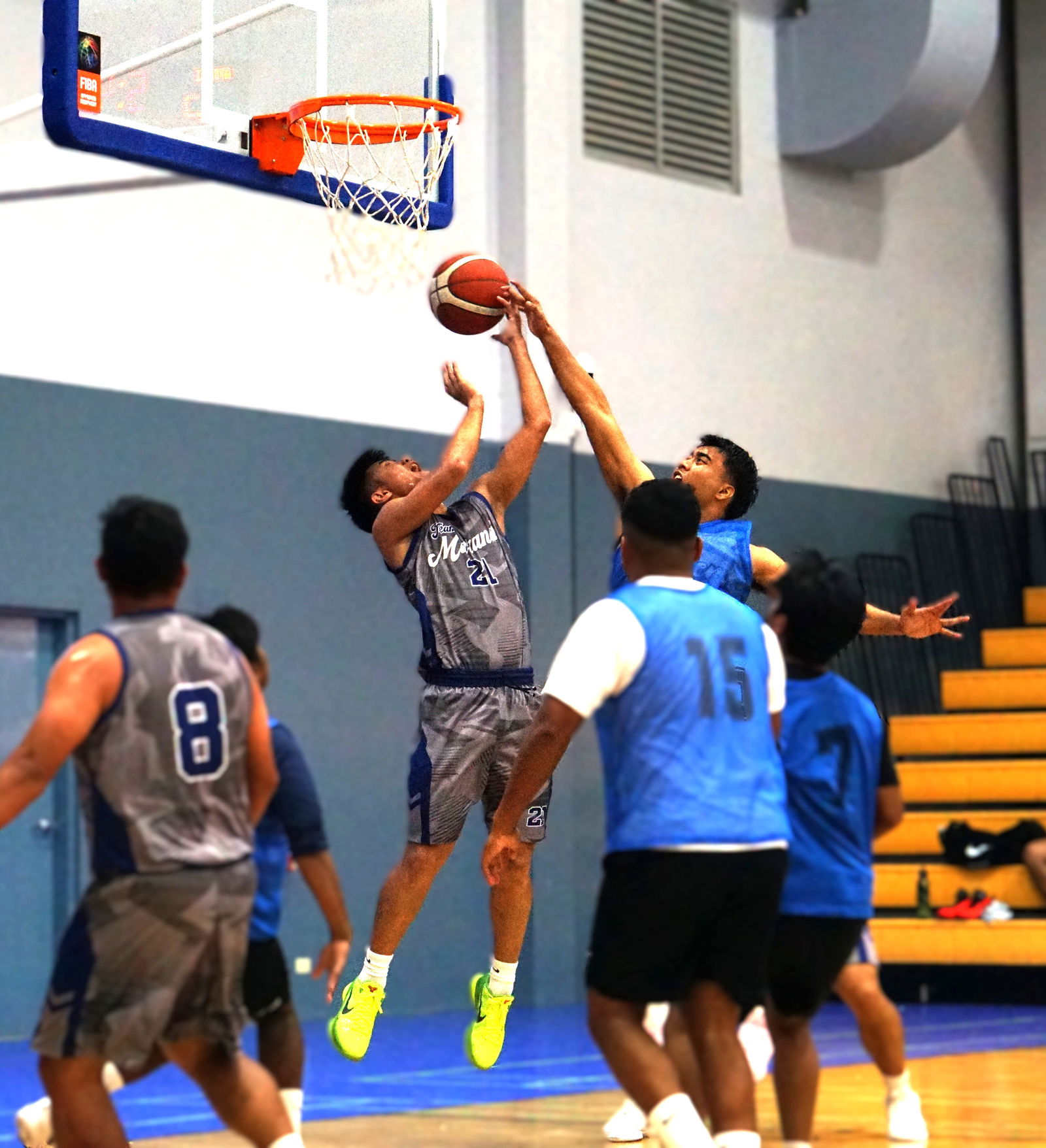 Akkari 1’s Freddie Pelisamen blocks Marianas’ Ervin Villarin during a Michelob Ultra Cup 2025 game at the Ada gym on Saturday.Photo by James F. Sablan Jr.