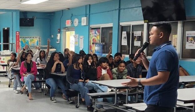 Marianas Visitors Authority Community Projects Coordinator Jack Aranda addresses 7th graders at Francisco M. Sablan Middle School on March 31, 2025.MVA photo