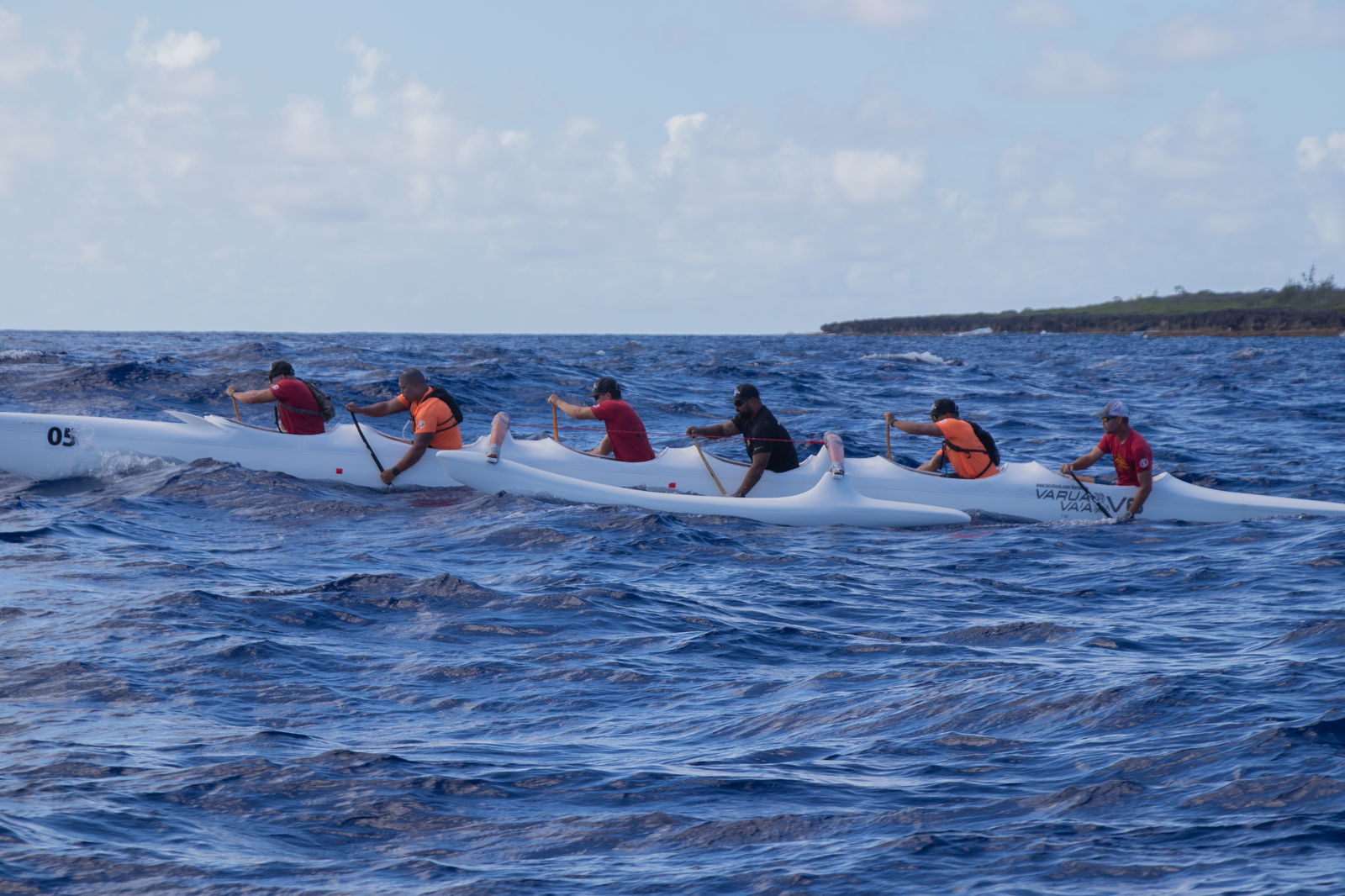 In this photo from last year's channel crossing, the northernmost tip of Tinian is seen behind the men of the Marianas Outrigger Club on their return paddle to Saipan.Contributed photo