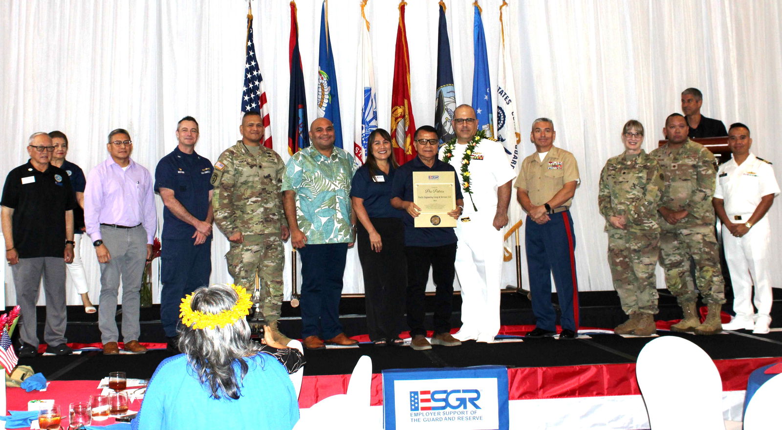 From left, Retired U.S. Army Maj. Gen. Benny M. Paulino, GU-CNMI ESGR Vice Chair; Lt. Col. Victor Balajadia, Director of Staff, Guam Air National Guard; Captain Robert Kistner, U.S. Coast Guard; Lt. Col. Romeo Sanchez, 1st-294th Infantry Battalion, Guam Army National Guard: Acting Gov. Joshua Tenorio; Cathyann C. Gogue, GU-CNMI ESGR State Chair; Gregorio Castro, President & CEO, Pacific Engineering Group and Services, LLC. receiving award; U.S. Navy Captain Craig S. Der Ananian, Navy Readiness and Mobilization Command, San Diego; Col. Ernest Govea, Commanding Officer, Marine Corps Base Camp Blaz, U.S. Marine Corp.; Lt. Col. Penny Sima, U.S. Army Reserve; Maj. Benjamin Guerrero, U.S. Air Force Reserve; and Lt. Commander Brian Matic, U.S. Navy Reserve. The photo was taken during the awarding of the 2024 Pro Patria Award - Small Business category to PEGS at the 16th Employers Awards luncheon on Aug. 29, 2024 at Hyatt Regency Guam.Contributed photo