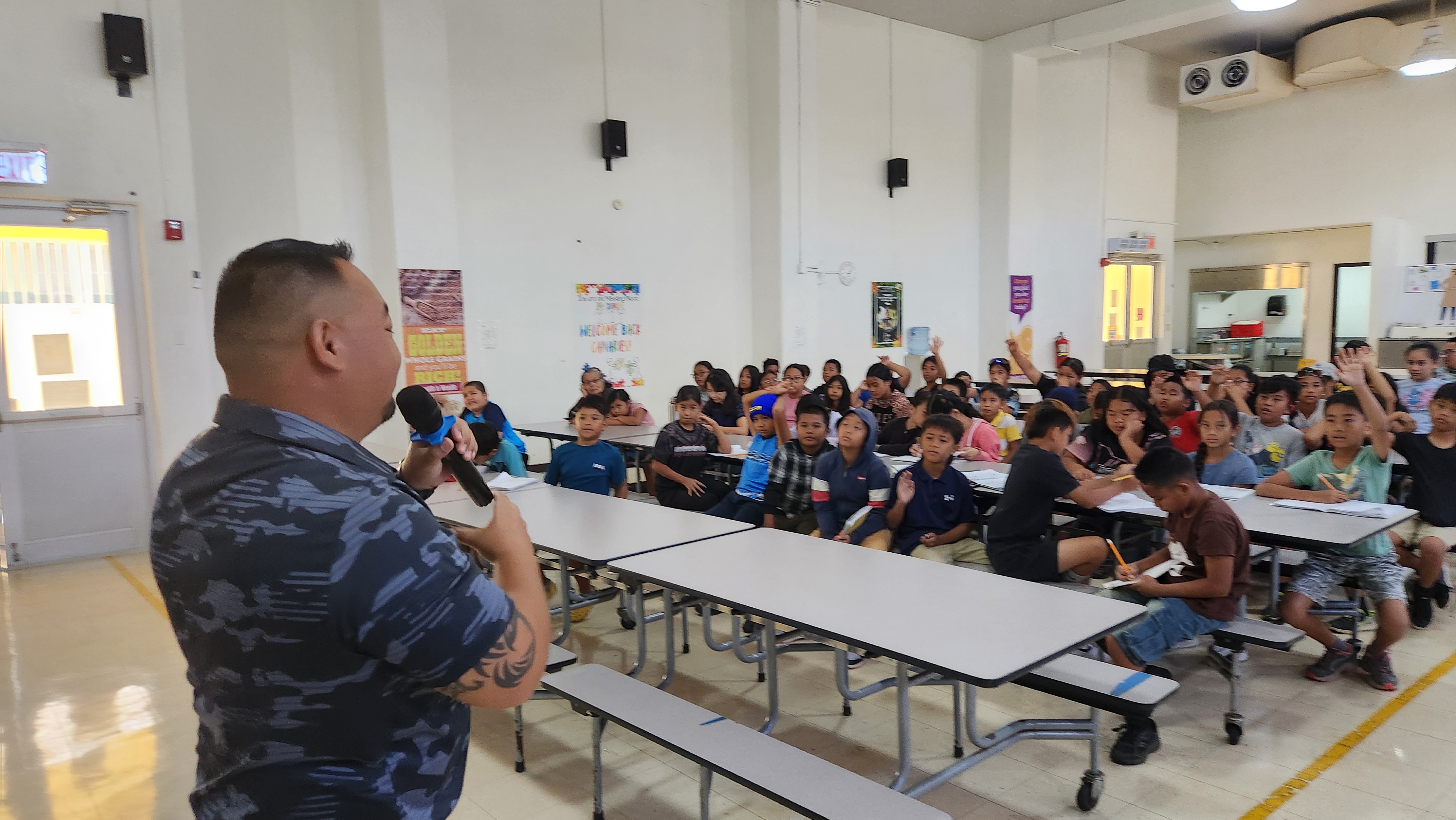 Marianas Visitors Authority Community Projects Coordinator Sherman Santos teaches 4th graders at San Vicente Elementary School about the agency on April 9, 2025.MVA photo