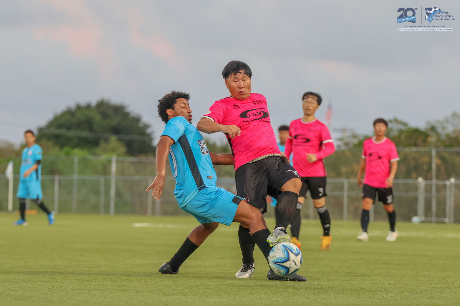 Hana FC's Yeong Gil Kim battles for possession against an Old B Bank defender during a match against the Bangladesh Football Club in the Marianas Soccer League 2 Spring 2025 at the NMI Soccer Training Center on Friday last week.NMIFA photo