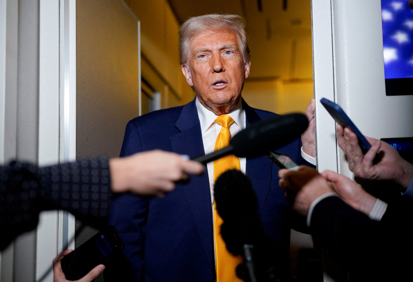 President Donald Trump speaks to the media on board Air Force One on the way to Miami, Florida, April 12, 2025.REUTERS