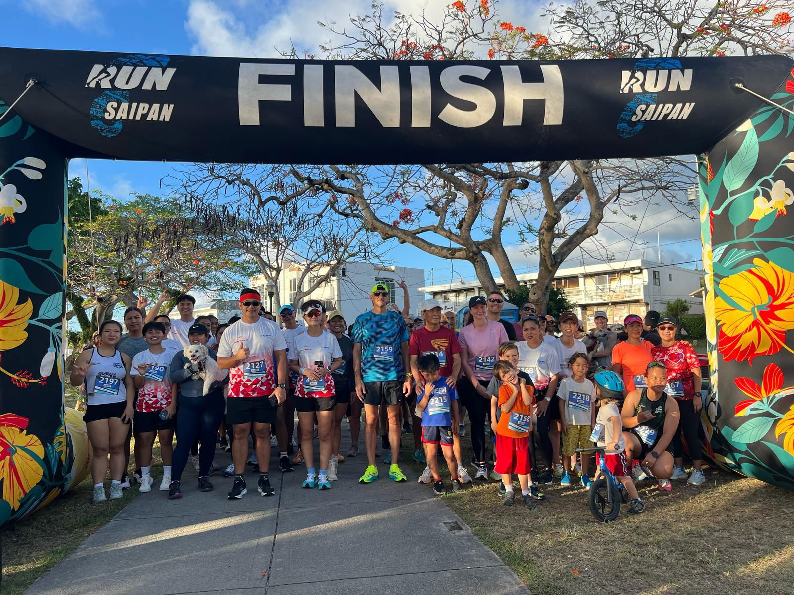 Participants are ready for the start of Run Saipan x CHCC Happy Hearts 5K on the Beach Road pathway on Friday.Contributed photo