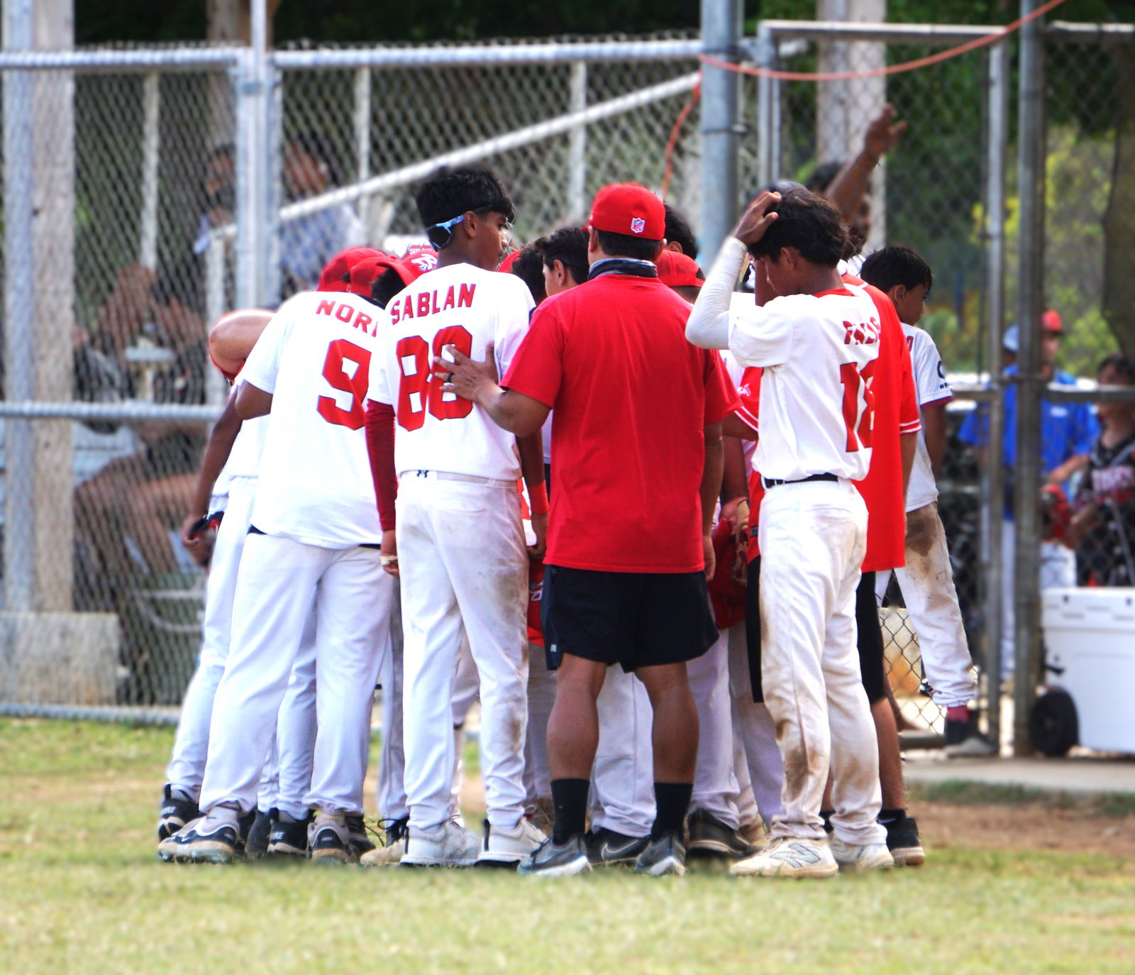 Braves Jr. huddle after winning a game in the junior division of the 2025 Saipan Little League Baseball at the Francisco "Tan Ko" Palacios Baseball Field.Photo by James F. Sablan Jr.