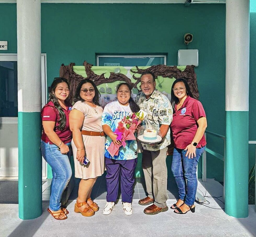 Sinapalo Elementary School Principal Juana Atalig with Acting BOE Chairman Anthony Dela Cruz Barcinas, Principal Daisy Quitugua, PSS Federal Programs Office staff members Nadia Pua and Maria Quitugua.
