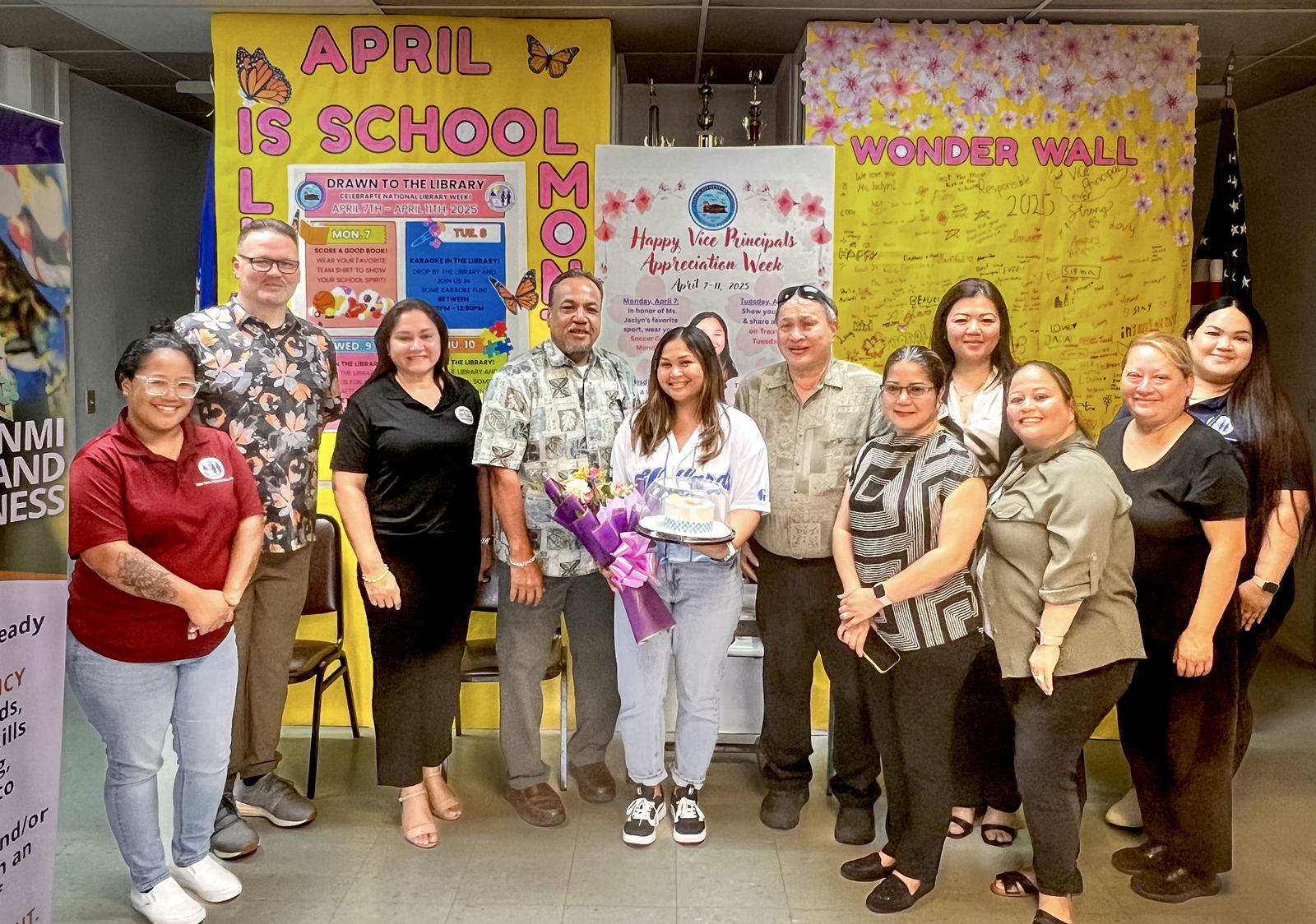 Garapan Elementary School Vice Principal Jaclyn Quitugua, center, with BOE Acting Chairman Anthony Dela Cruz Barcinas, BOE member Andrew L. Orsini, Acting Commissioner of Education Jacqueline P. Che, Principal Derwin Johnson, Human Resource Office Director Lucretia Deleon Guerrero, Finance Director Arlene Lizama, Special Education State Director Donna M. Flores, Career and Technical Education Director Jessica Taylor, and BOE staff members Jocelyn Saures and Mary-Jo Camacho.
