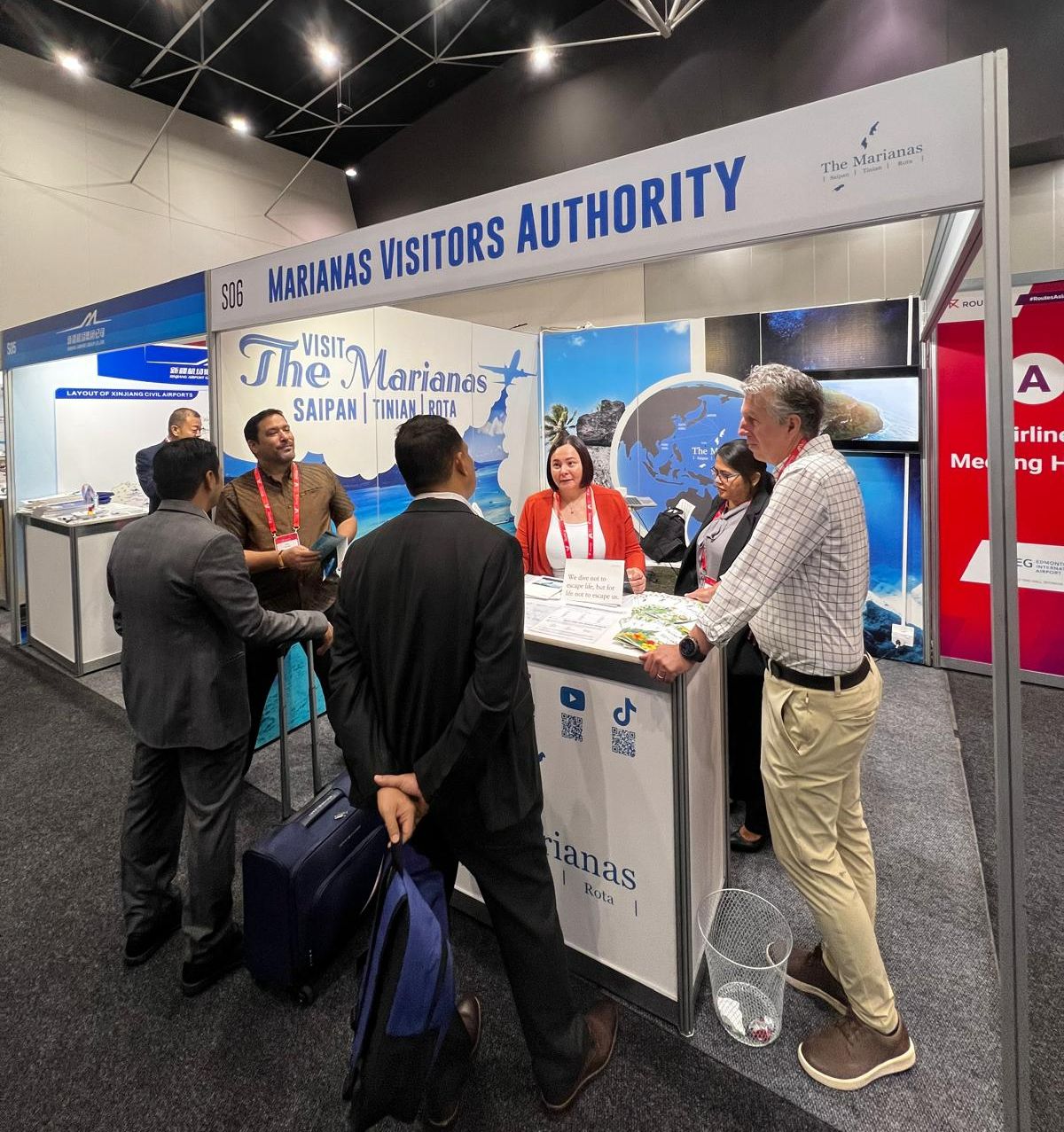 Marianas Visitors Authority Managing Director Jamika R. Taijeron, third right, speaks with delegates to Routes Asia Show 2025 held on March 25-27, 2025, in Perth, Australia. Also pictured are Glen Hunter representing the CNMI Office of the Governor, second left, and CPA Enforcement/Lease Compliance Officer JoyAnn Tenorio, second right.MVA photo