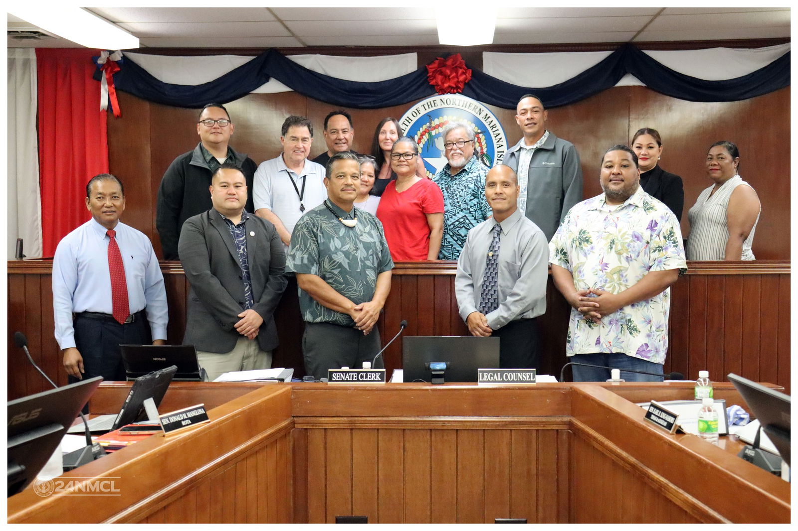Former Rep. Rosemond B. Santos-Sword, center, and husband, Gary Sword, pose for a photo with senators and Commonwealth Utilities Corp. Executive Director Kevin Watson after the Senate confirmation of her nomination to the CUC board on Friday.Legislative Bureau photo