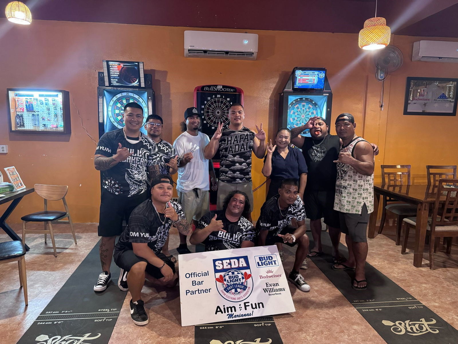 The Drunken Dartz and the Bull Breakers pose for a photo after completing their match in the A Division of the 2025 SEDA Bud Light Dart League at Tom Yum Restaurant on Monday. Contributed photo