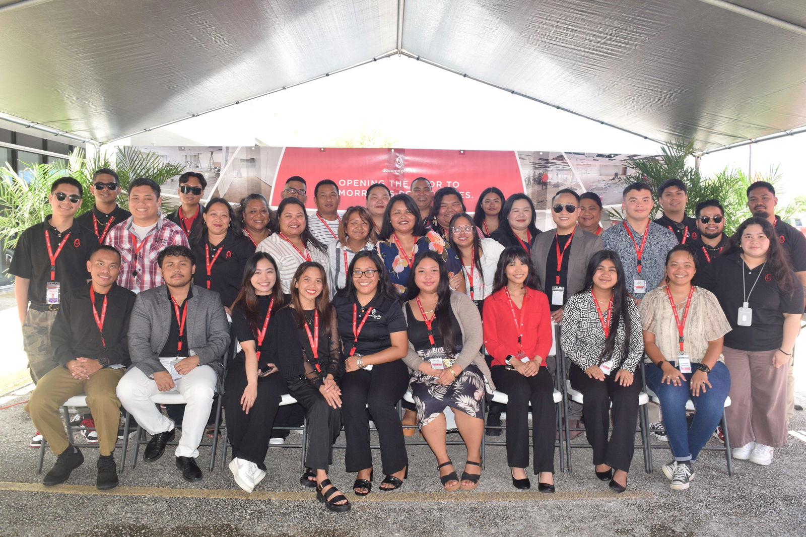 Docomo Pacific’s call center staff members pose for a group photo.