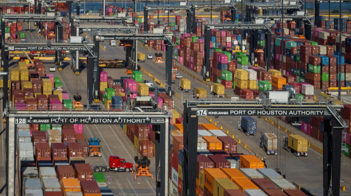 A drone view shows trucks as they transport cargo at the Bayport Container Terminal in Seabrook, Texas, April 7, 2025.REUTERS