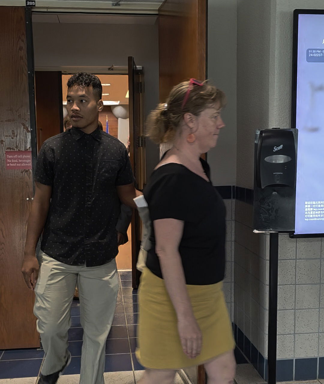 Teipo Nikiti with Assistant Public Defender Emily Thomsen.