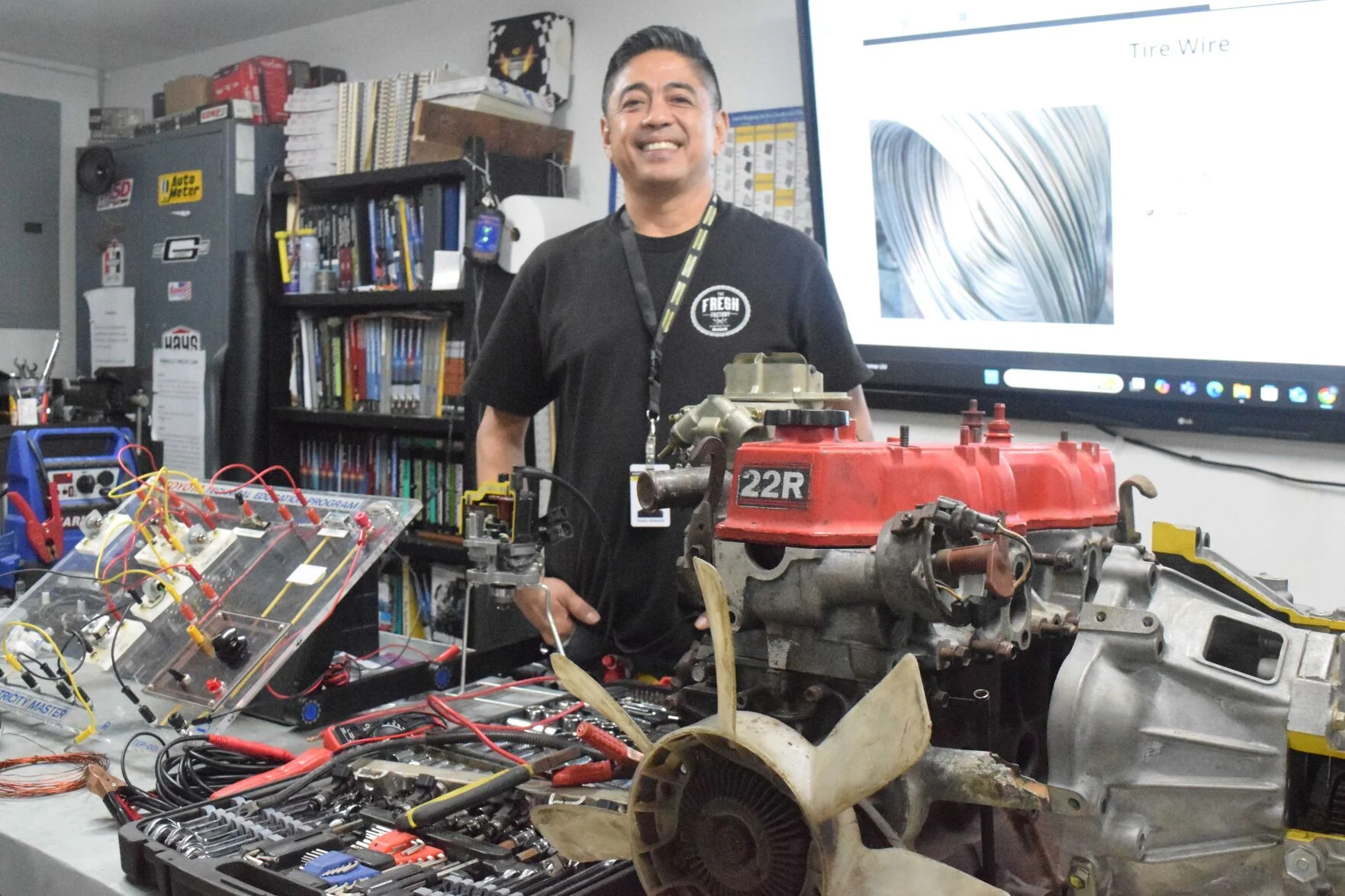 YCO Corporation board member Dante N. Yumul is shown at the Northern Marianas Technical Institute where he teaches automotive technology.