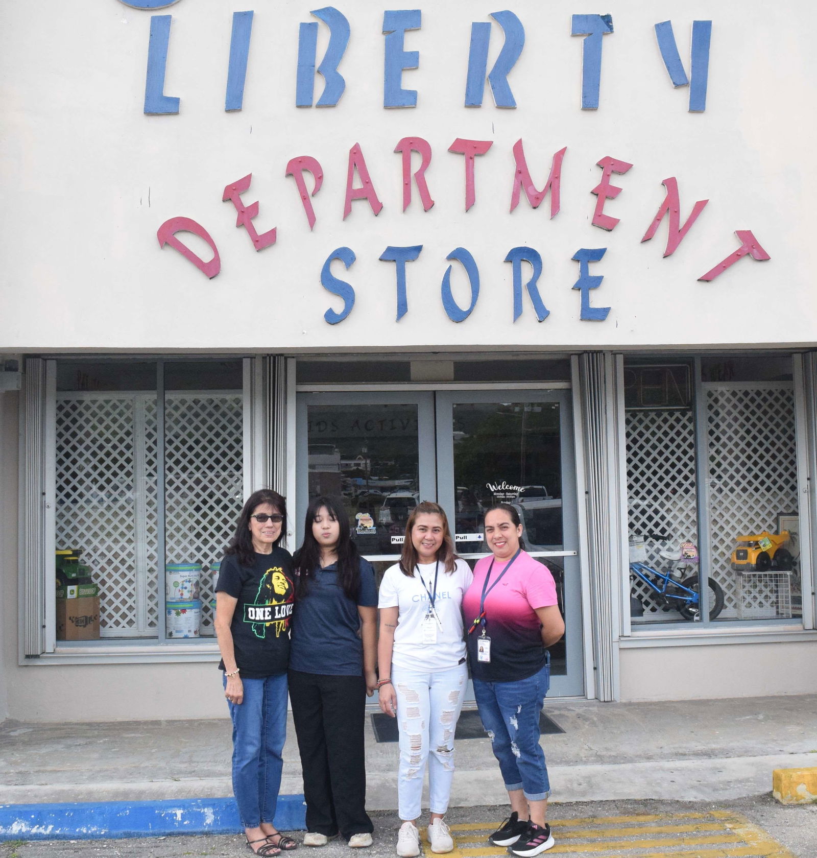 From left are Francisca Yumul and Liberty Department Store staff Kris Sabido, Kristhinne Nunez, and Ann Barce.