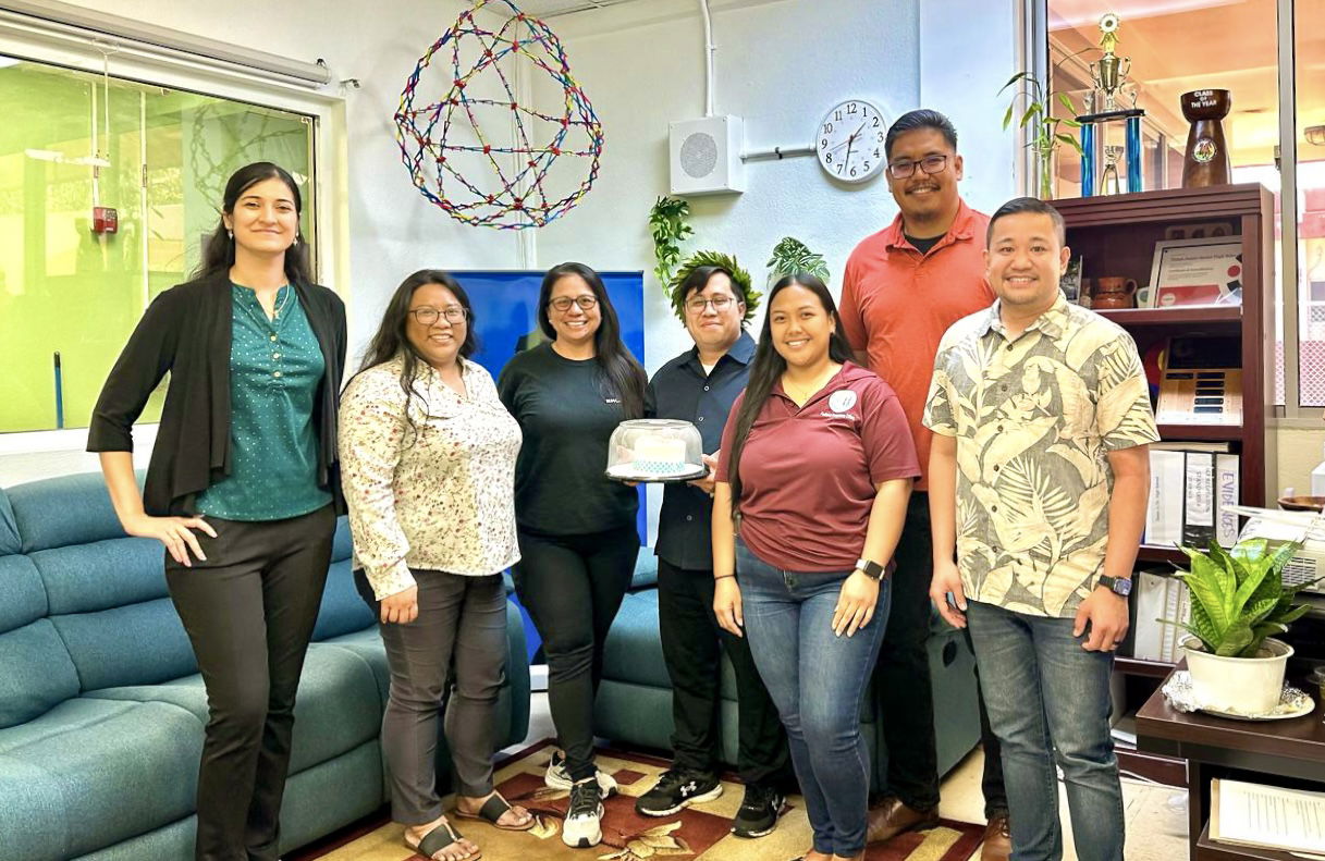 Tinian Middle and High School Vice Principal Edward Hoschneider with BOE Secretary/Treasurer Antonio L. Borja, second right, BOE member Maisie B. Tenorio, third left, PSS Instructional Technology and Distance Education Director Dr. Lorraine Catienza, second left, ITDE staff member Dr. Riya Nathrani, Federal Program Office staff member Richelle Castro, and Office of Administrative Service staff member Frankie Camacho.
