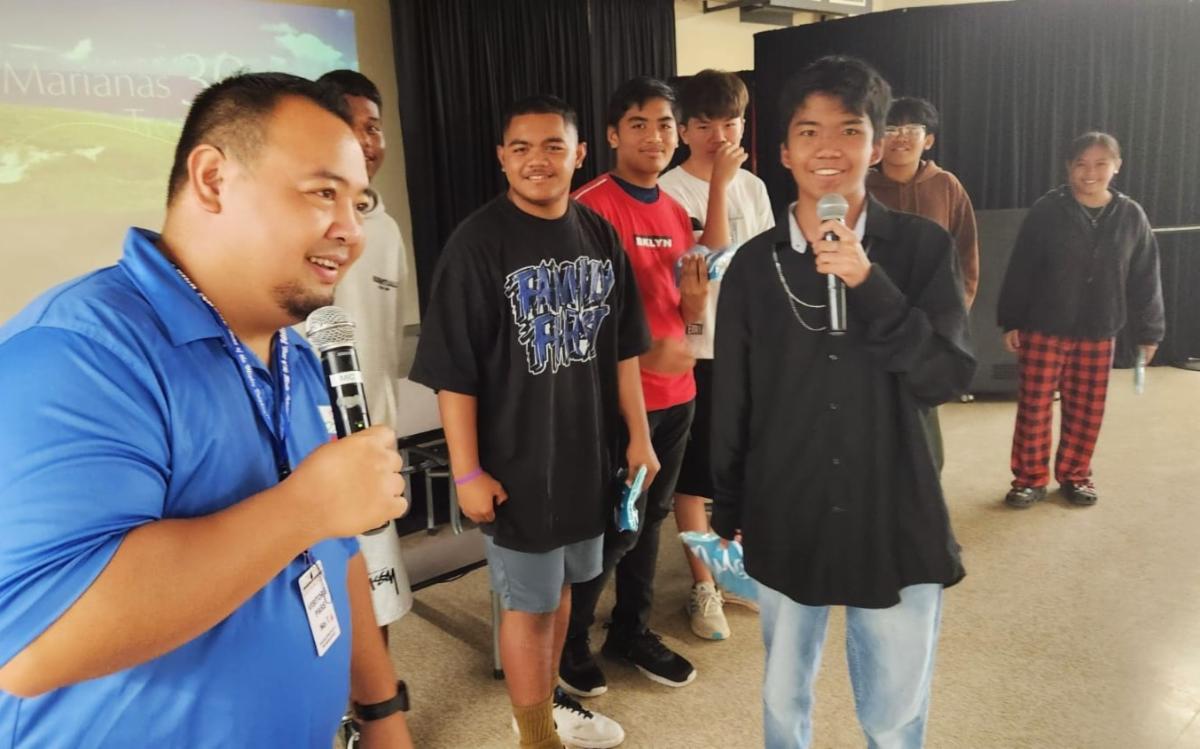 Students of Marianas High School share some of the facts they’ve learned about tourism as Marianas Visitors Authority Community Projects Coordinator Sherman Santos listens. MVA and the Marianas Tourism Education Council visited the school in Susupe, Saipan, on April 2, 2025, to teach about fundamentals of The Marianas tourism economy and how students can support the industry.MVA photo