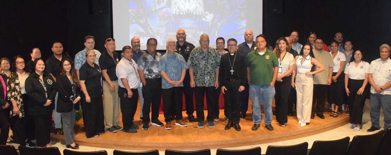 Gov. Arnold I. Palacios, Lt. Gov. David M. Apatang and Bishop Romeo Convocar join department heads and cabinet members in a group photo after the proclamation signing.Photo by Emmanuel T. Erediano