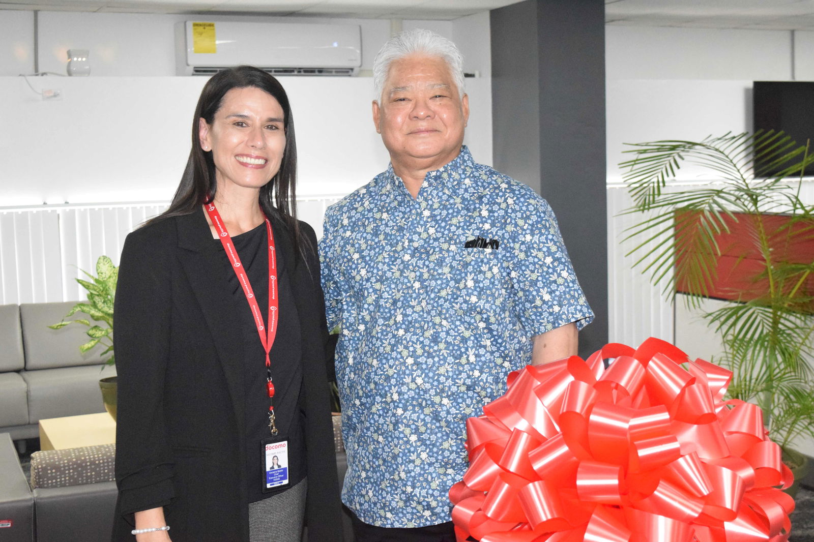 Gov. Arnold I. Palacios poses with Docomo Pacific President and Chief Executive Officer Christine Baleto following a ribbon-cutting ceremony for the telecommunications company’s expanded call center on Middle Road in Gualo Rai on Friday.Photo by Emmanuel T. Erediano