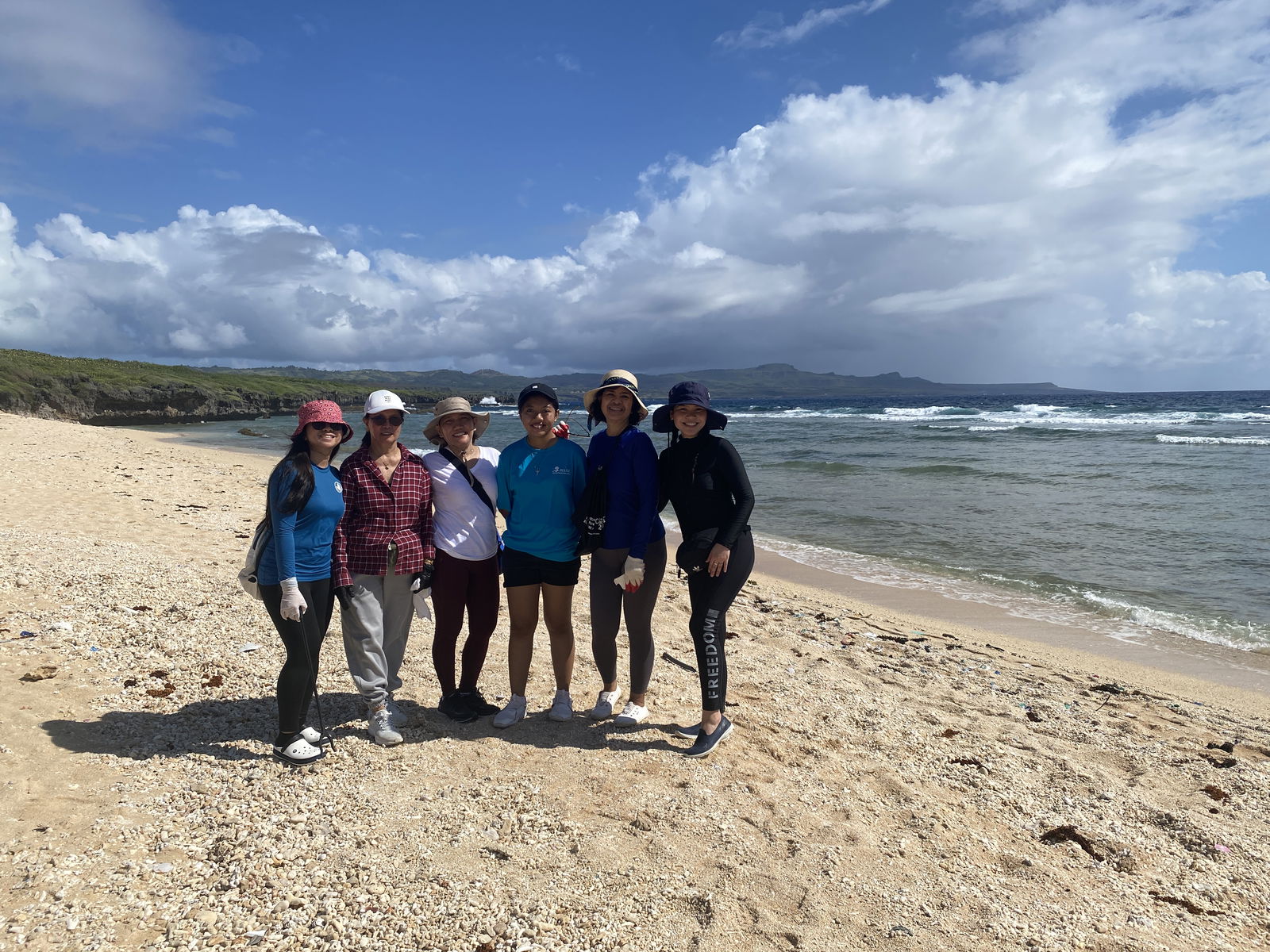 Marianas Dental Center’s Shane Solomon, far right, said she and her coworkers encountered much plastic during the cleanup.
