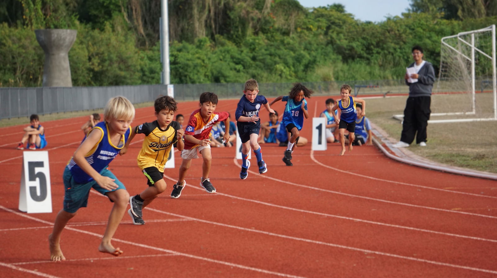 U12 division runners in action during a 200m event in the elementary school category of the PSS-NMA All School Track and Field SY24-25 at the Oleai Sports Complex on Tuesday.Photo by James F. Sablan Jr.